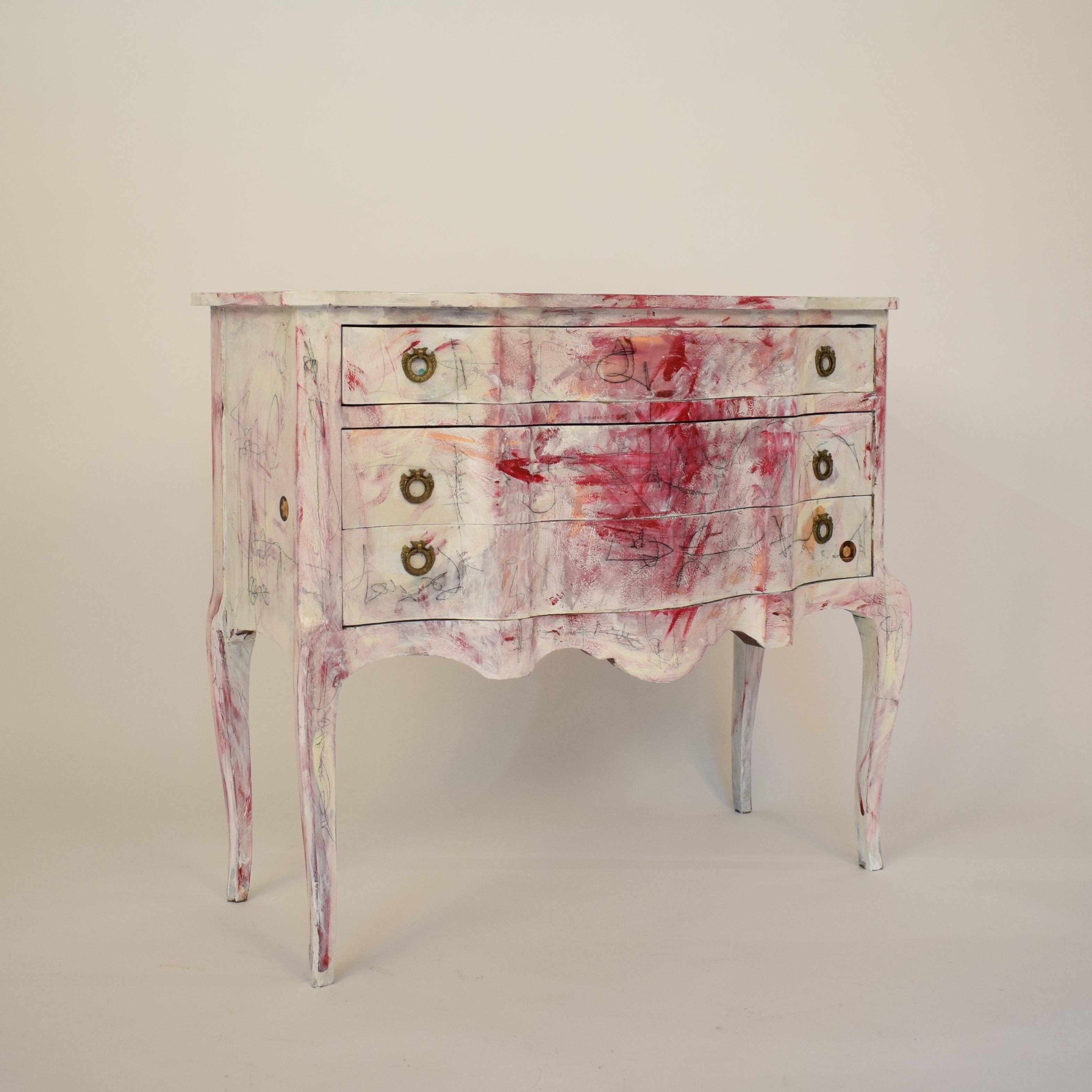 This beautiful hand painted contemporary chest of drawers was made by the Berlin based Artist Felix Bachmann.
The substrate of the commode is pine and hardwood. The surface coat is hand painted with acrylic, chalk and pencil.
There is a final coat
