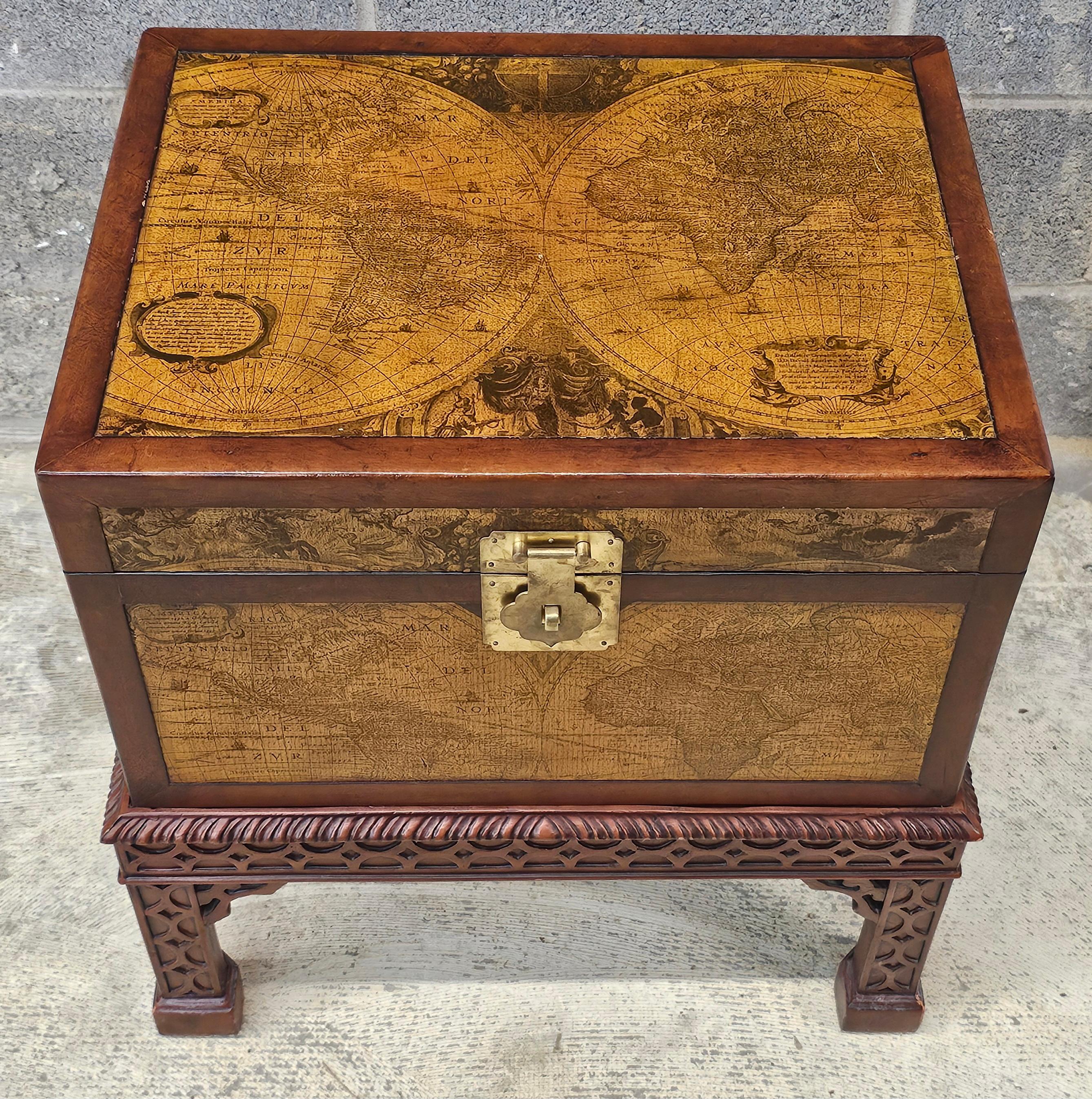 A Contemporary Chest on Leather Decorated and Carved Blind  Fretwork Mahogany Stand. Great vintage condition.
Measures 22