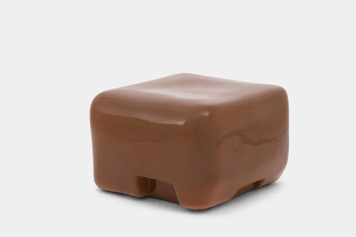 Contemporary chestnut ceramic low side table / stool, Cobble Low by Faye Toogood

Durable and smoothly rounded ceramic furniture with gentle asymmetries cast in a specialised laboratory-grade high gloss glaze suitable for interior and exterior