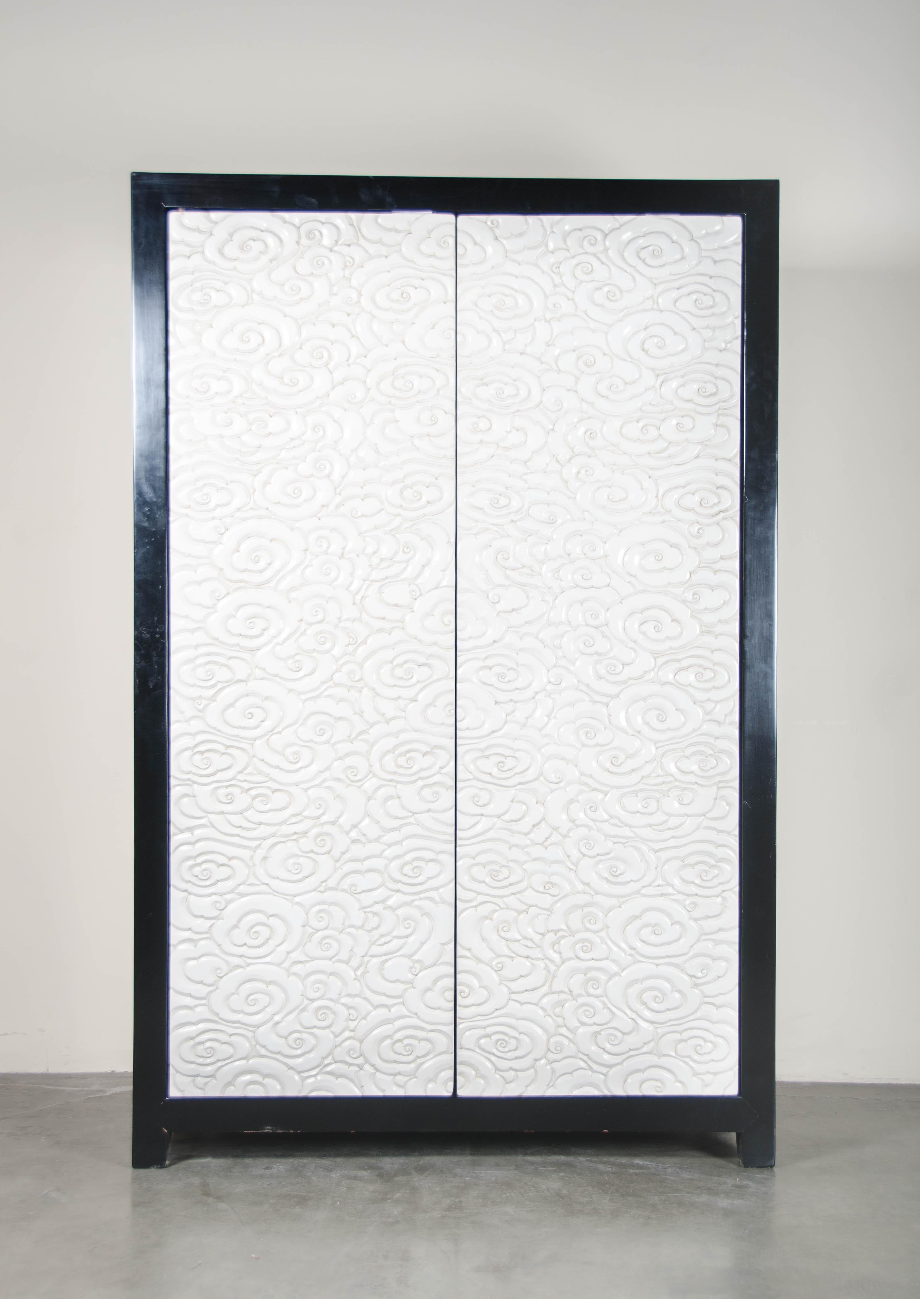 Cloud Design Armoire
Cream Lacquer
Hand Carved
Elm Wood
Contemporary 

Lacquer is a laborious and time-consuming process. After it is tapped from the trees, lacquer needs to be boiled and strained to rid of impurities and prepare it as a coating.