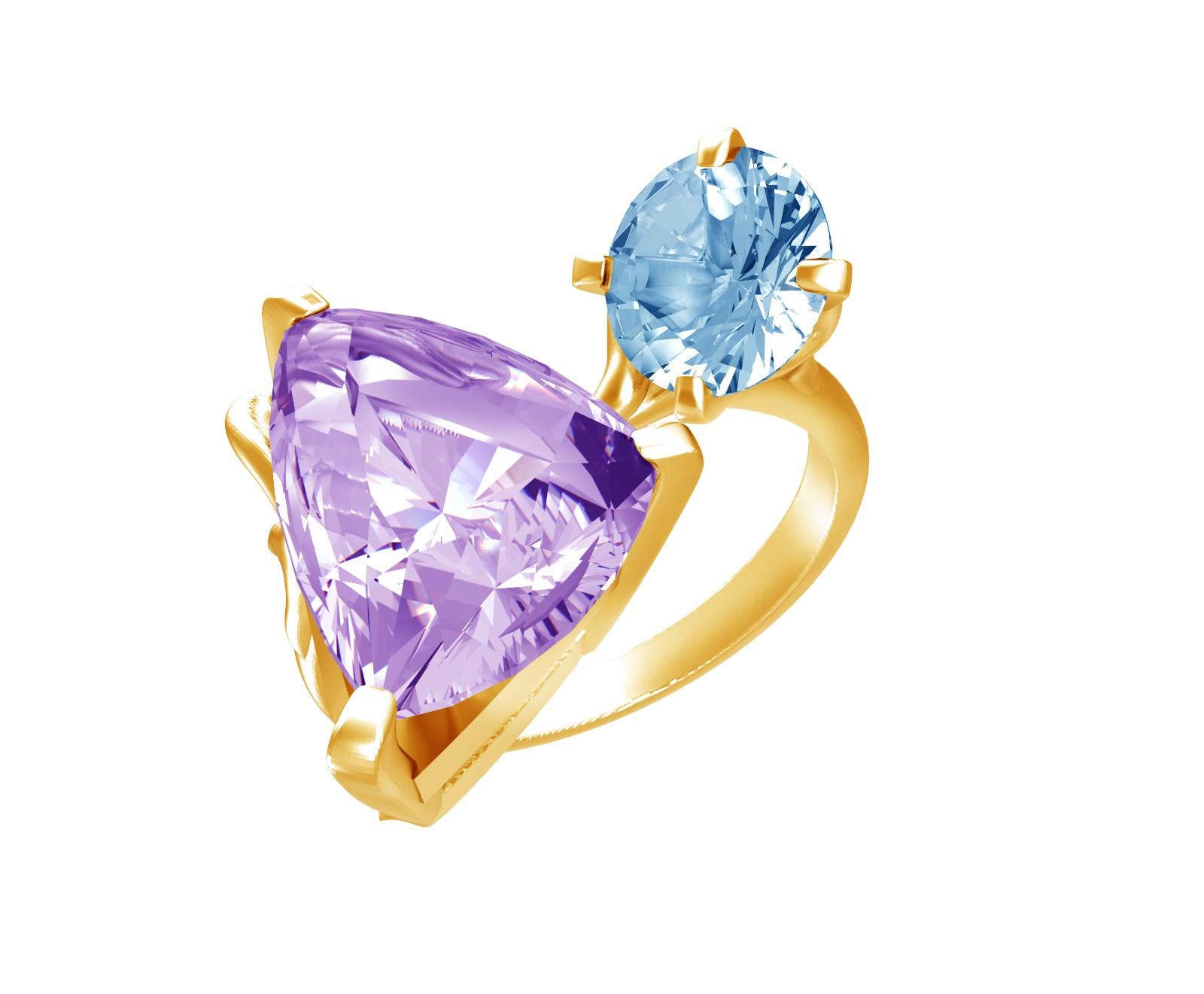 This contemporary engagement ring is made of 18 karat yellow gold with trillion cut amethyst and blue round cut paraiba tourmaline. The unusual angle of the gems placement makes it look even bigger, as a perfect cocktail ring. 

The ring will be