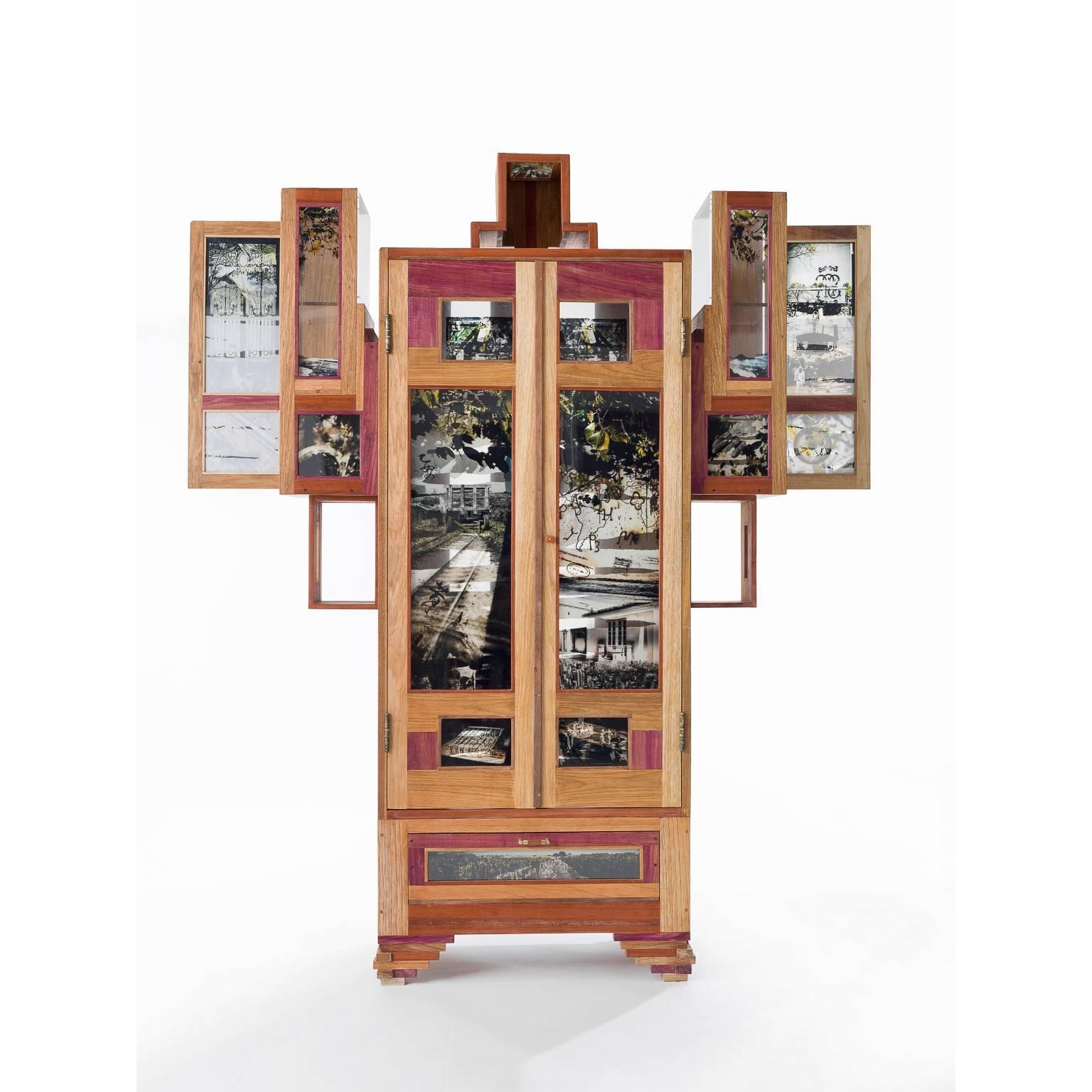 This contemporary cabinet is made of handcrafted Amazonian woods (Jequitiba, Muirapiranga, Cedro, Roxinho, Freijo, Sucupira), acrylic, 16 lambda prints, Japanese handmade paper and metal.

This piece is the result of artisanal production process,