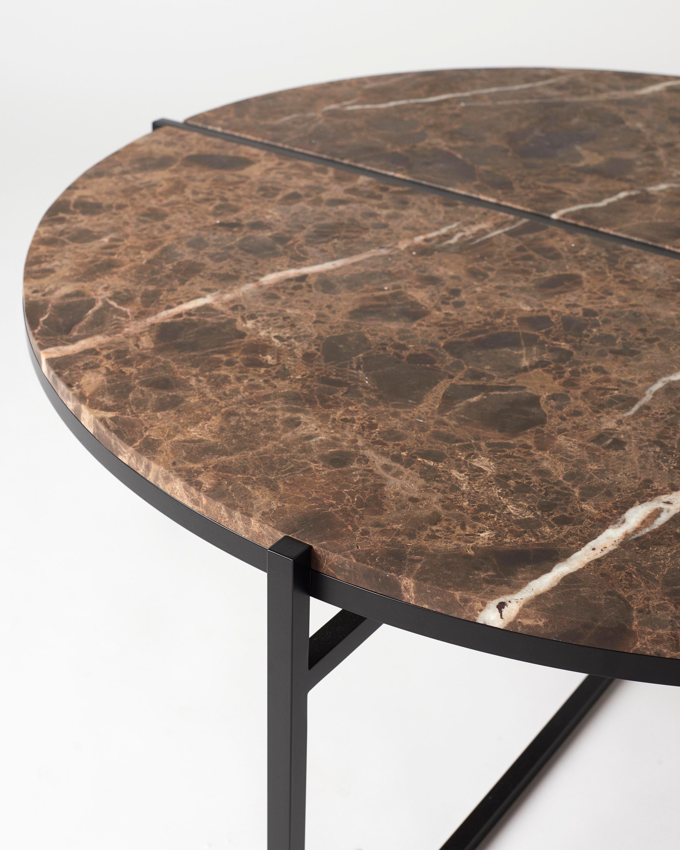 The other way round coffee table creates sophisticated and sculptural aesthetics for any room with its characteristic cut of the top plate, beautiful mirrored frame and clean visual lines.

The mirrored frame creates a shifting effect and separate
