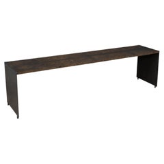 Table basse contemporaine en broussin de noyer et acier bruni de Costantini, Vinn