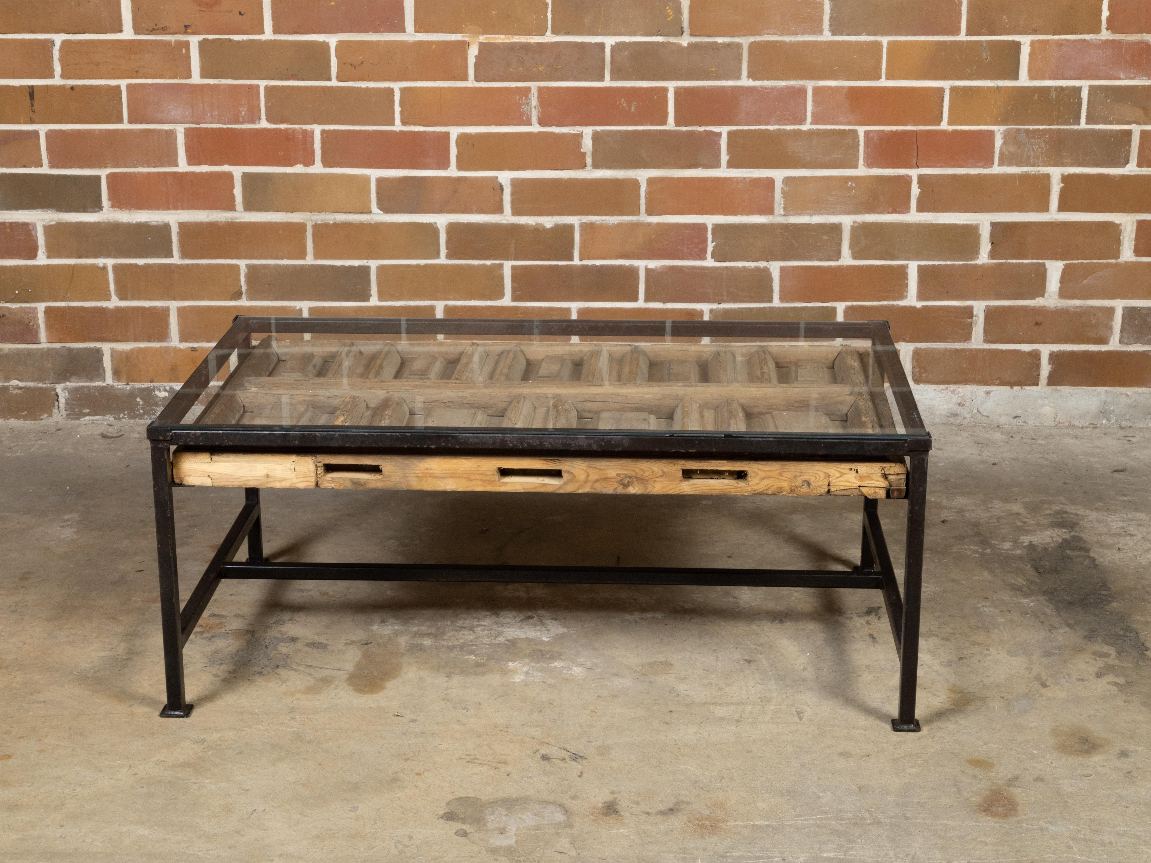 Glass Contemporary Coffee Table Made with Antique Door Fragment on Custom Iron Base For Sale