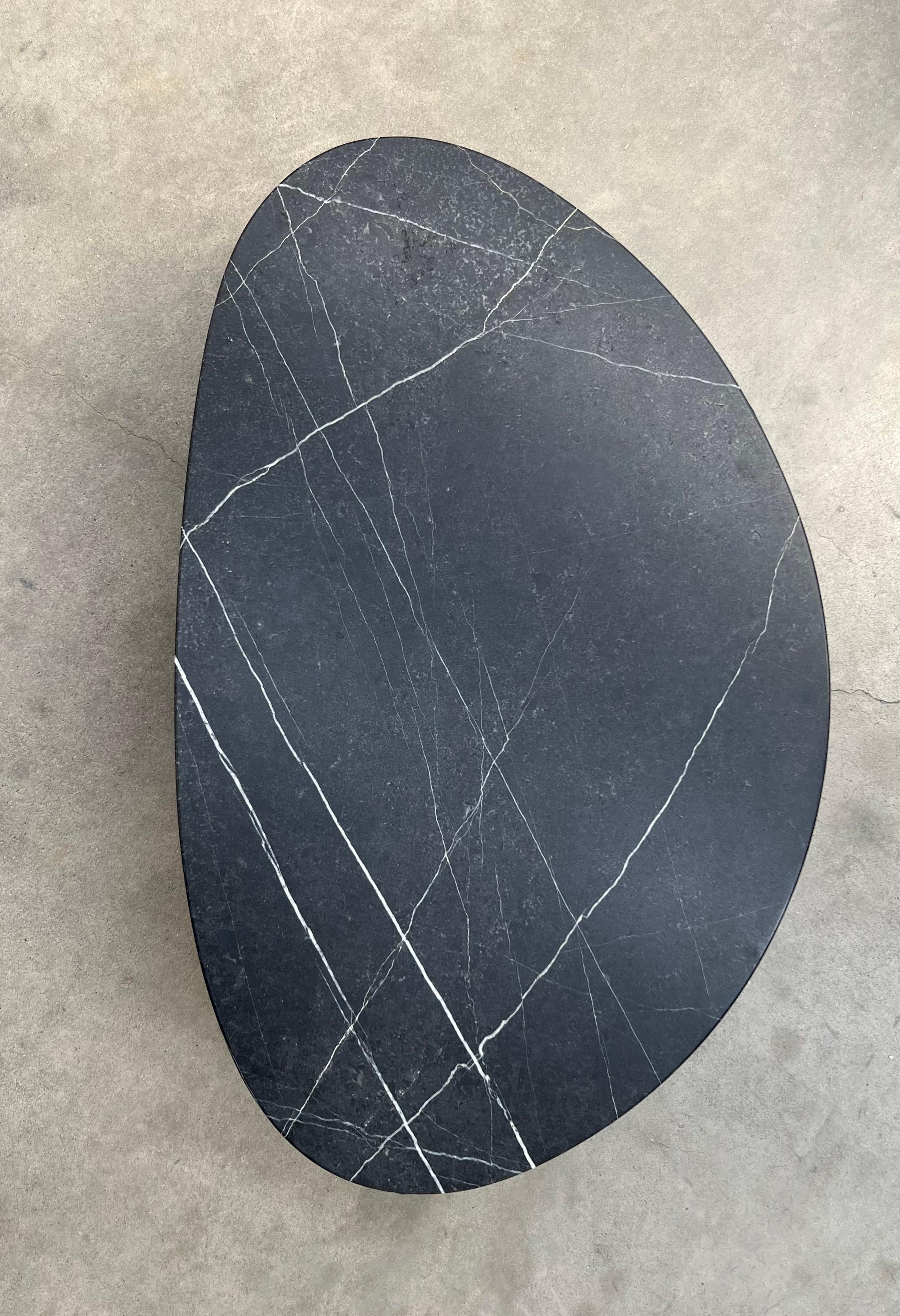 black marble coffee table round
