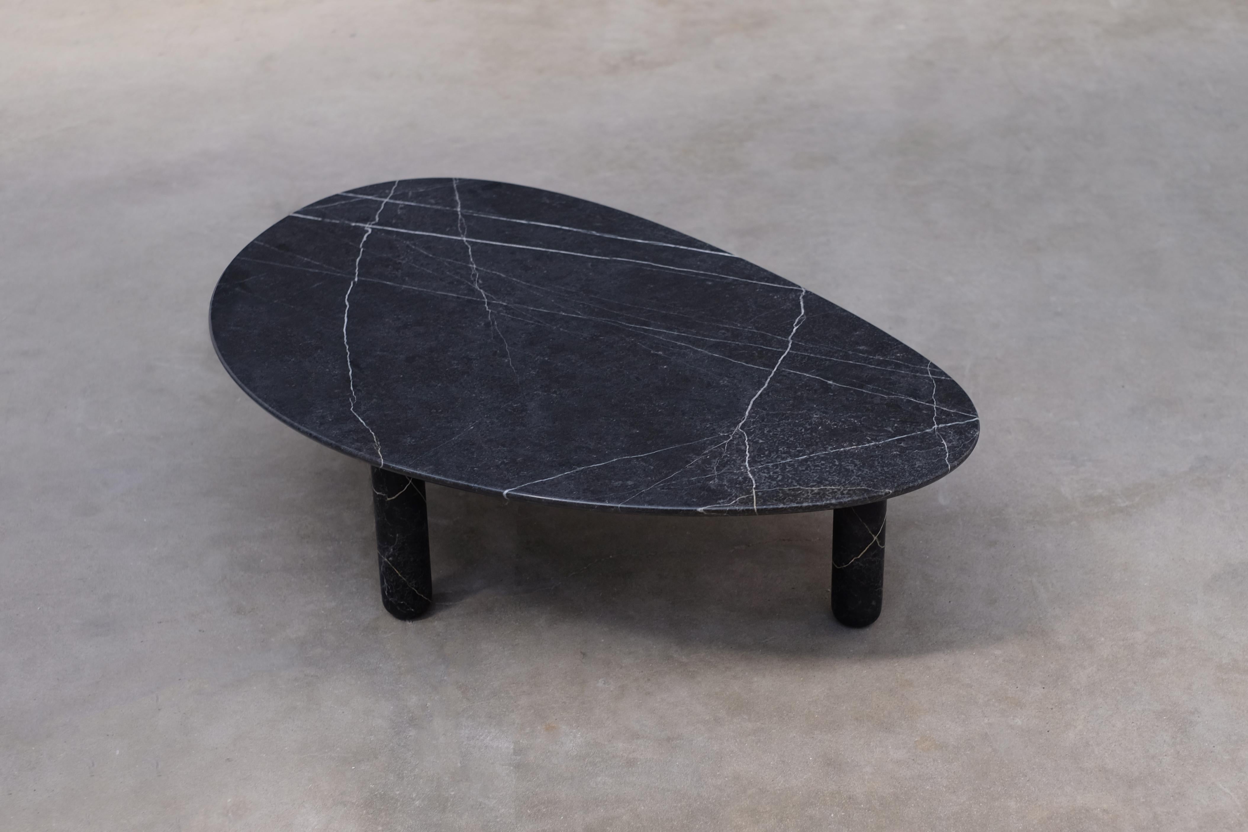 round marble coffee table with black legs