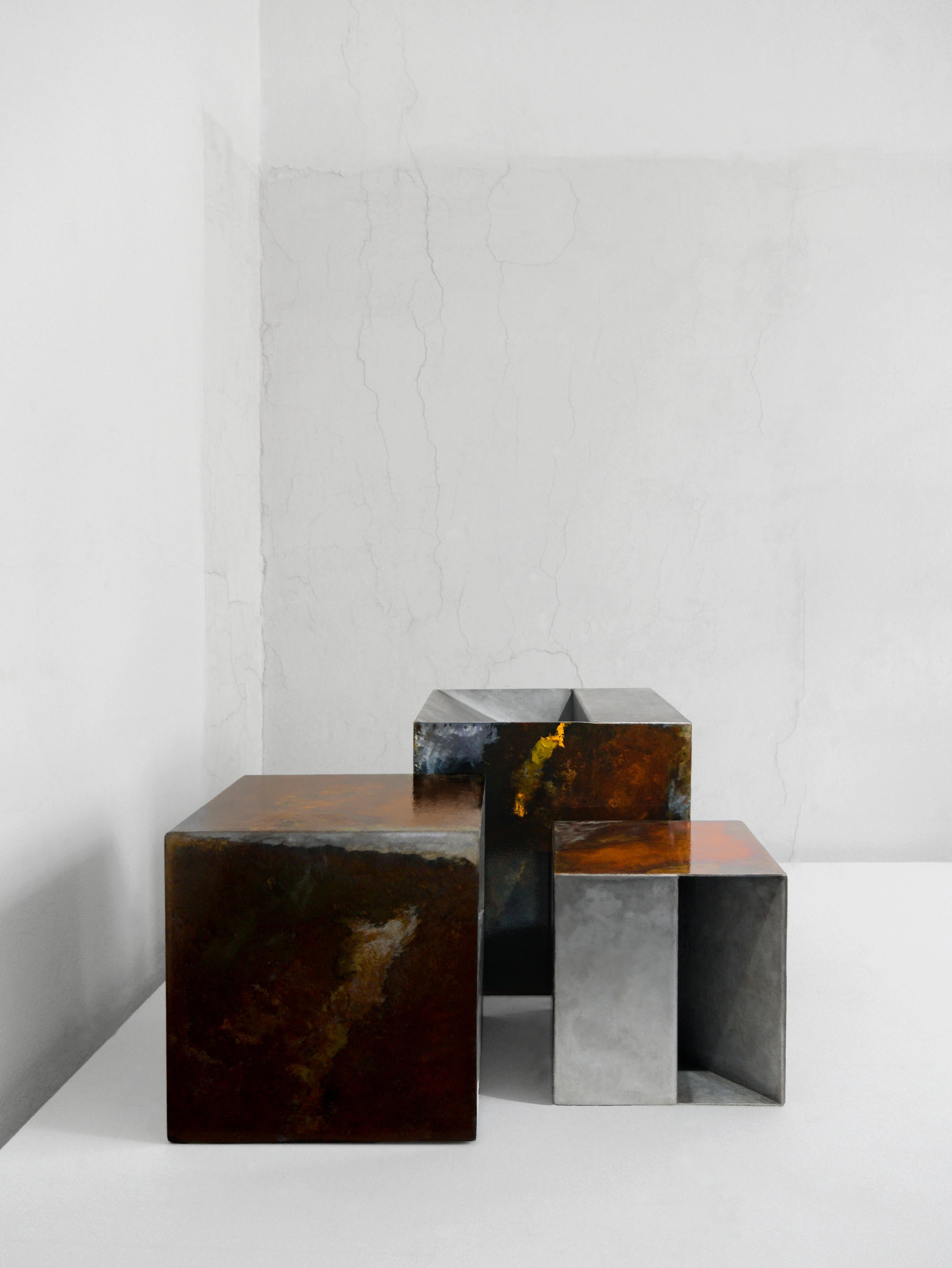 THE BOX Tables

The box shaped set of three tables made out of the raw steel, precisely covered with the natural, hand-crafted rust patinas. Each of the objects has the steel, functional ‘shelf’ and its own characteristic patterns of rust making