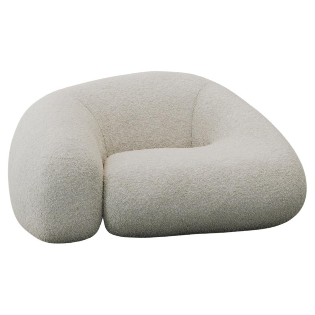 Fauteuil contemporain Colar aux formes douces