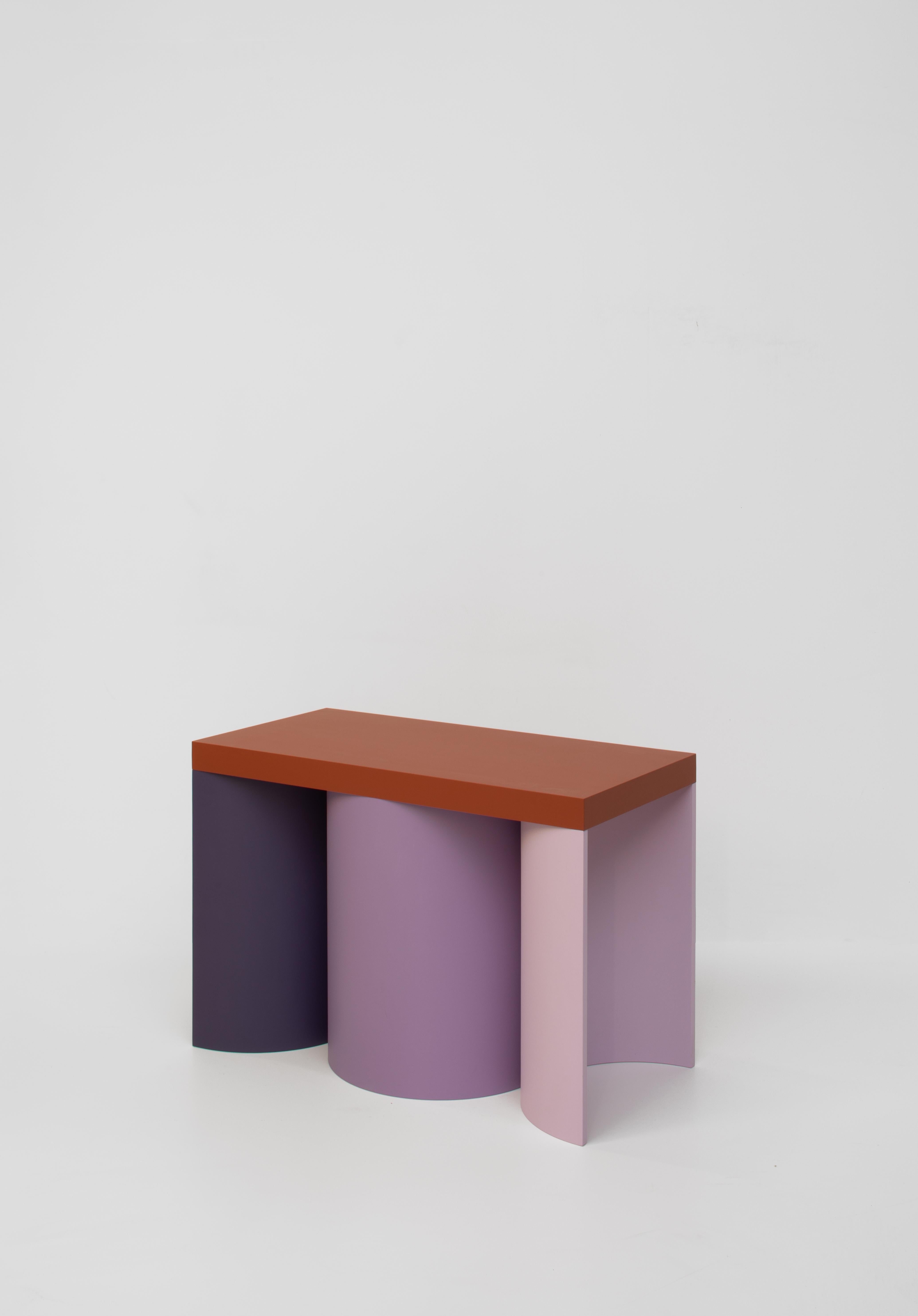 Colourful stool with a contemporary design.
Manufactured in an artisanal way, in which every step of the process is carefully executed. The base of this stool consists of varying numbers of hollow cylinders. It's topped with a slab surface for