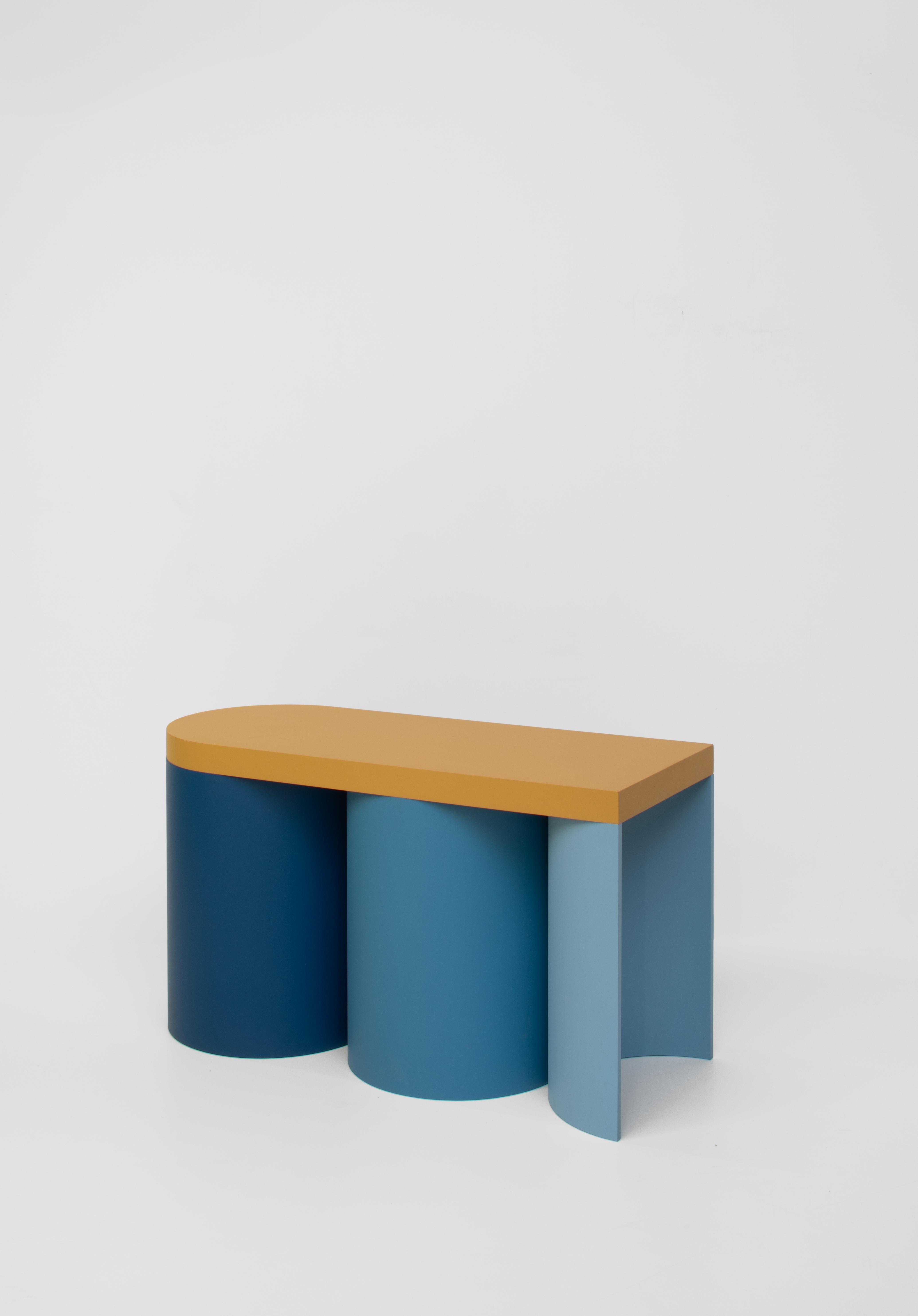 Colourful stool with a contemporary design.
Manufactured in an artisanal way, in which every step of the process is carefully executed. The base of this stool consists of varying numbers of hollow cylinders. It's topped with a slab surface for
