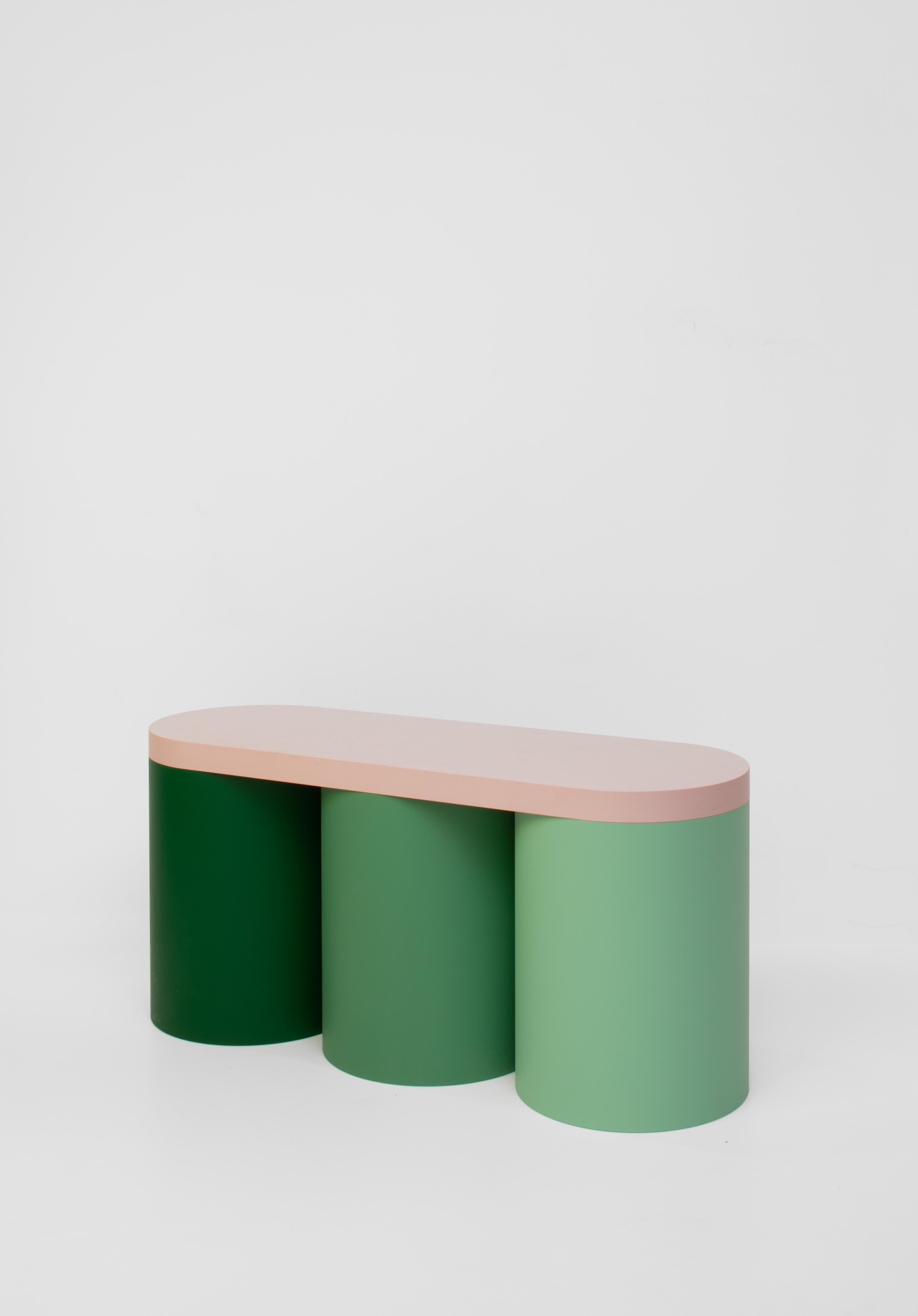 Colourful stool with a contemporary design.
Manufactured in an artisanal way, in which every step of the process is carefully executed. The base of this stool consists of varying numbers of hollow cylinders. It's topped with a slab surface for