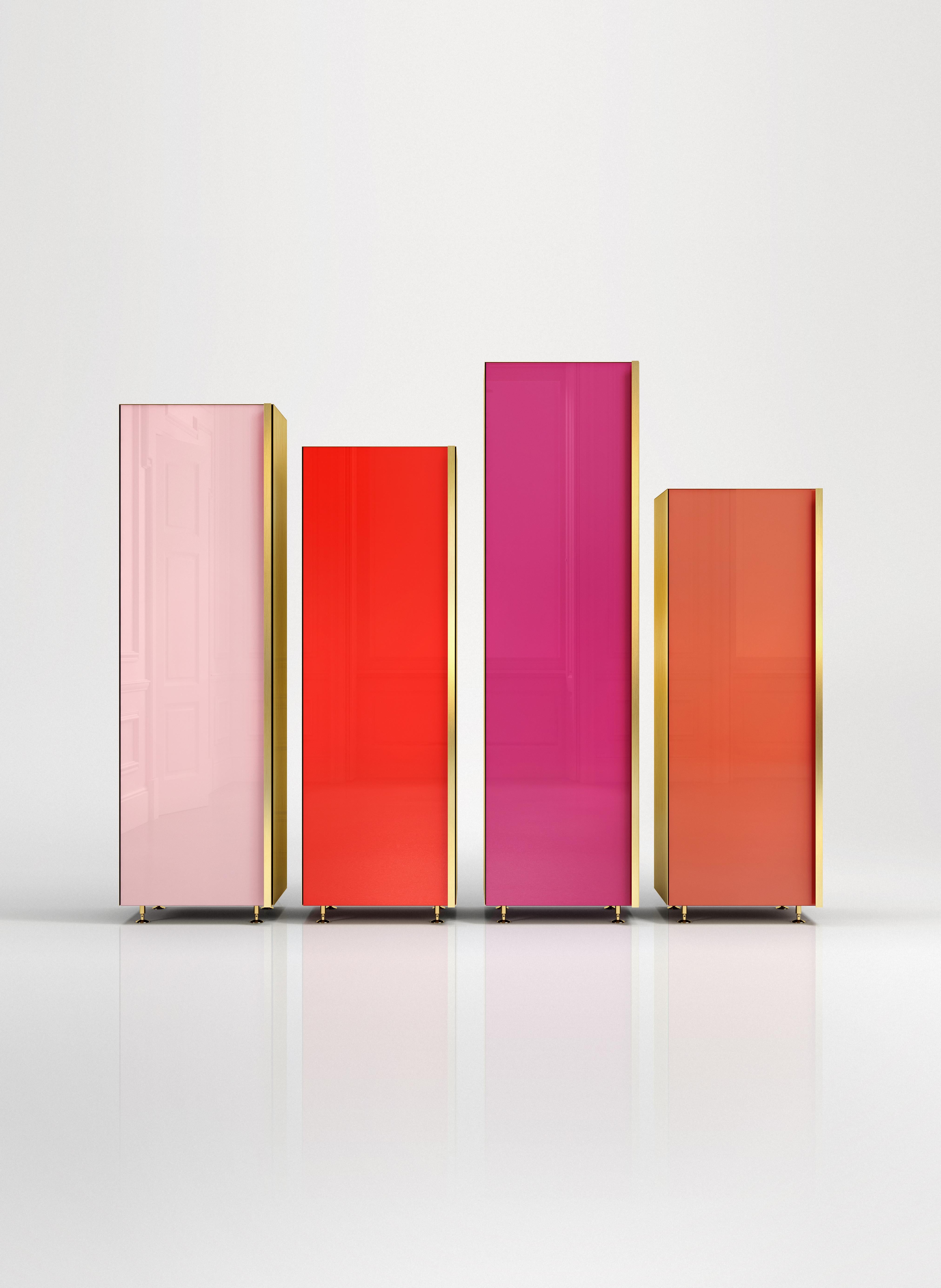 Column Set 01
Set of four separate containers with different heights. Back-painted glass door colored in warm tones, lacquered wooden interior and full height brass handle and sides. The four elements can be placed in any interior environment as