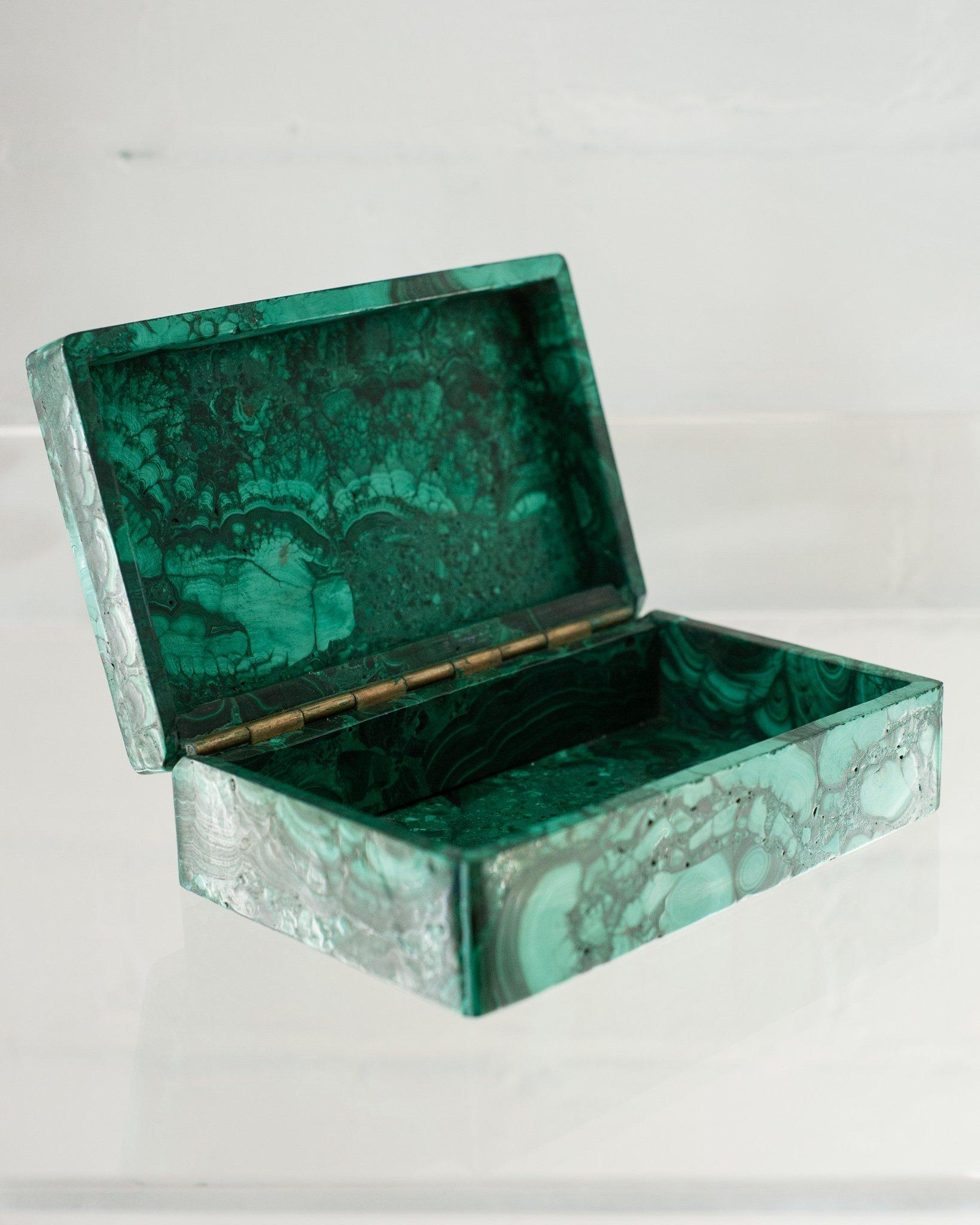 Bring St. Petersburg into your home with a Congo Malachite boxes. The Winter Palace in Russia contains one of the most outstanding displays of this gemstone in a room called The Malachite Room, designed in the 1830s.

Known as the stone of