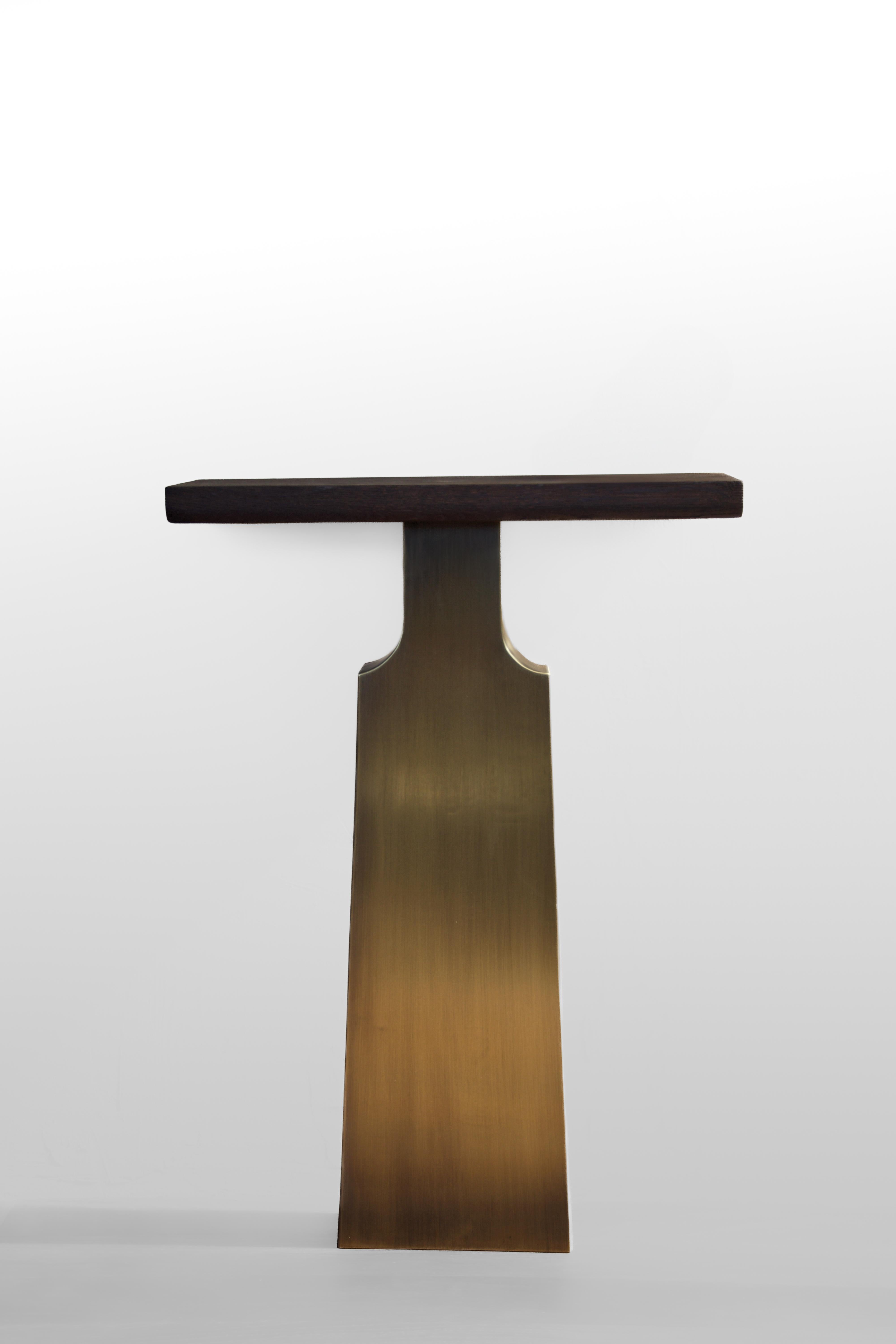 LIAH Console Table by German contemporary design studio Eichkorn. 
Material: Brass and Burnt Oak Wood
Standard size: H.78 x 55 x 20 cm - Customizations are possible

Liah Console - Timeless and simple design with the warmth of burnished brass and
