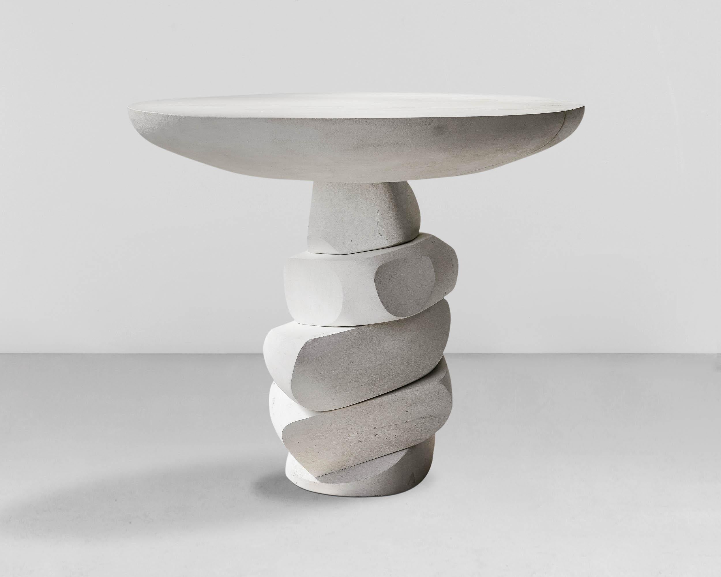 Contemporary table in lismestone 'Unamed' by denHolm.

Each creation is unique and signed by the artist.

Dimensions:
H. 80 cm
L. 125 cm
W. 125 cm

Material:
South Australian Limestone, sculpted entirely by hand.
---
Artist and