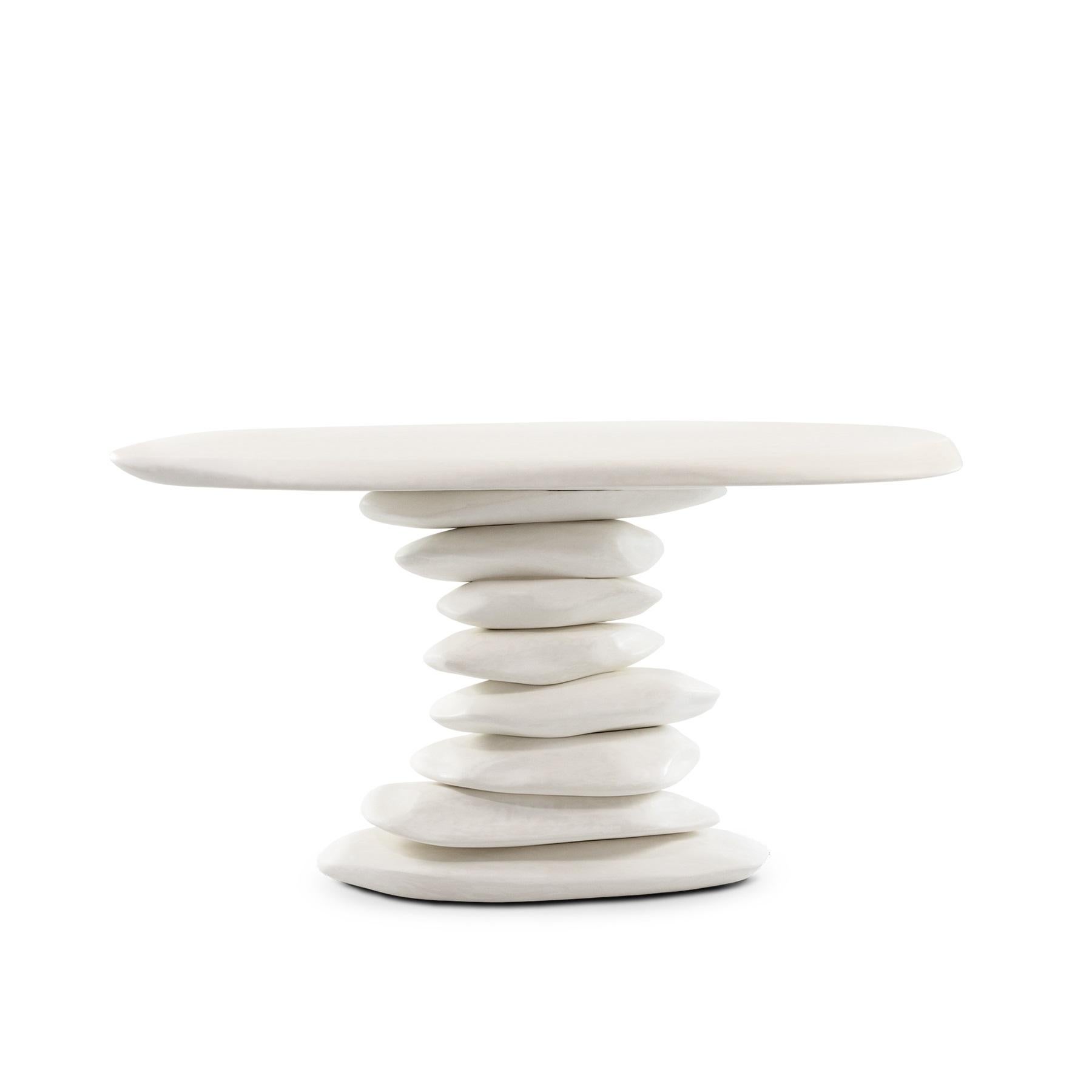 This exceptional console table is a true statement piece, distinguished by its unique and sculptural form. It is masterfully constructed from stacked irregular pieces of wood, an innovative design choice that transforms the functional into the