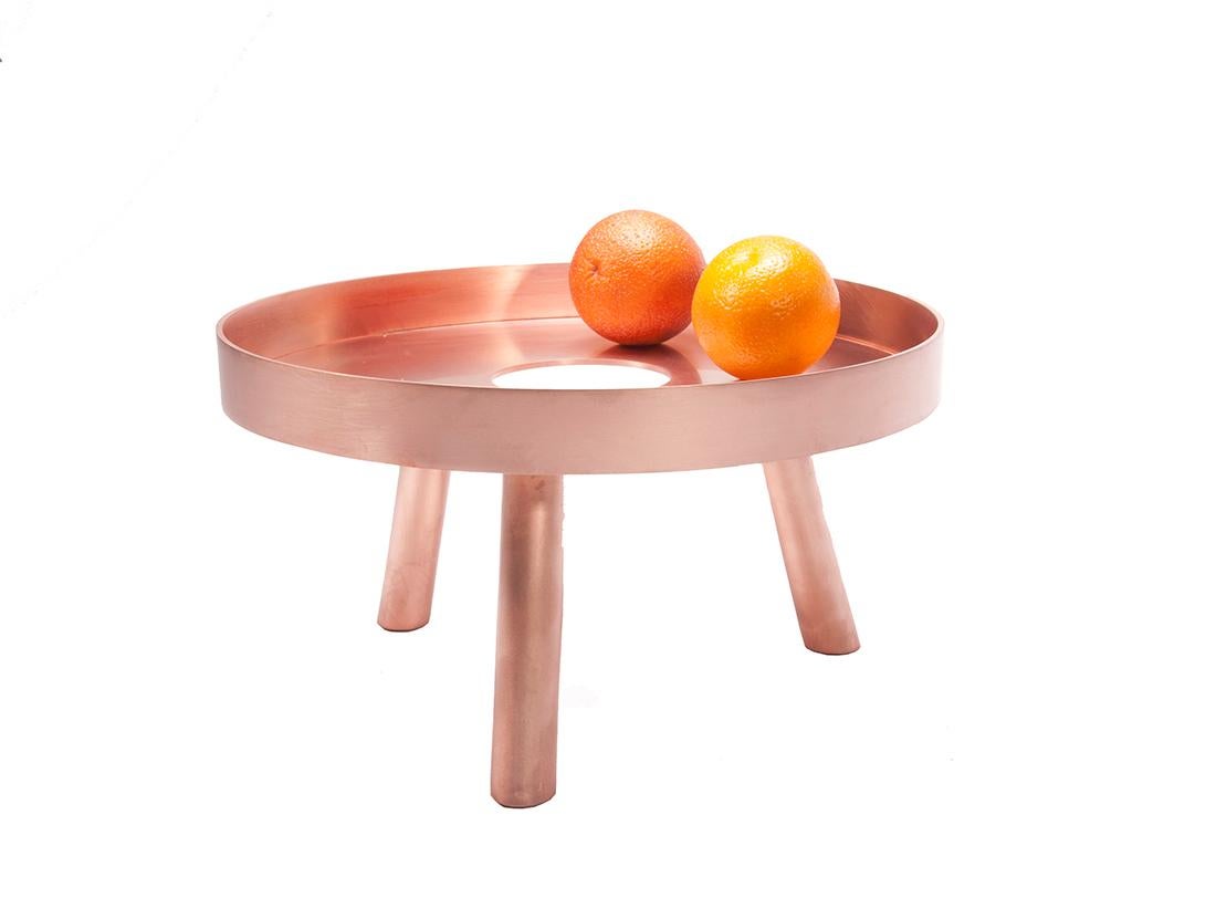 Simple. Elegant. Minimalist. The contemporary copper large serving tray titled lift will redefine the landscape of your table setting. Inspired by the Pantheon in Rome with its powerful oculus and strong Minimalist domed ceiling, the life can be