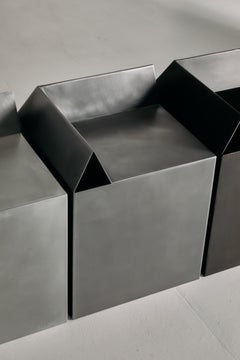 Contemporary Corner Stool in Raw Waxed Steel