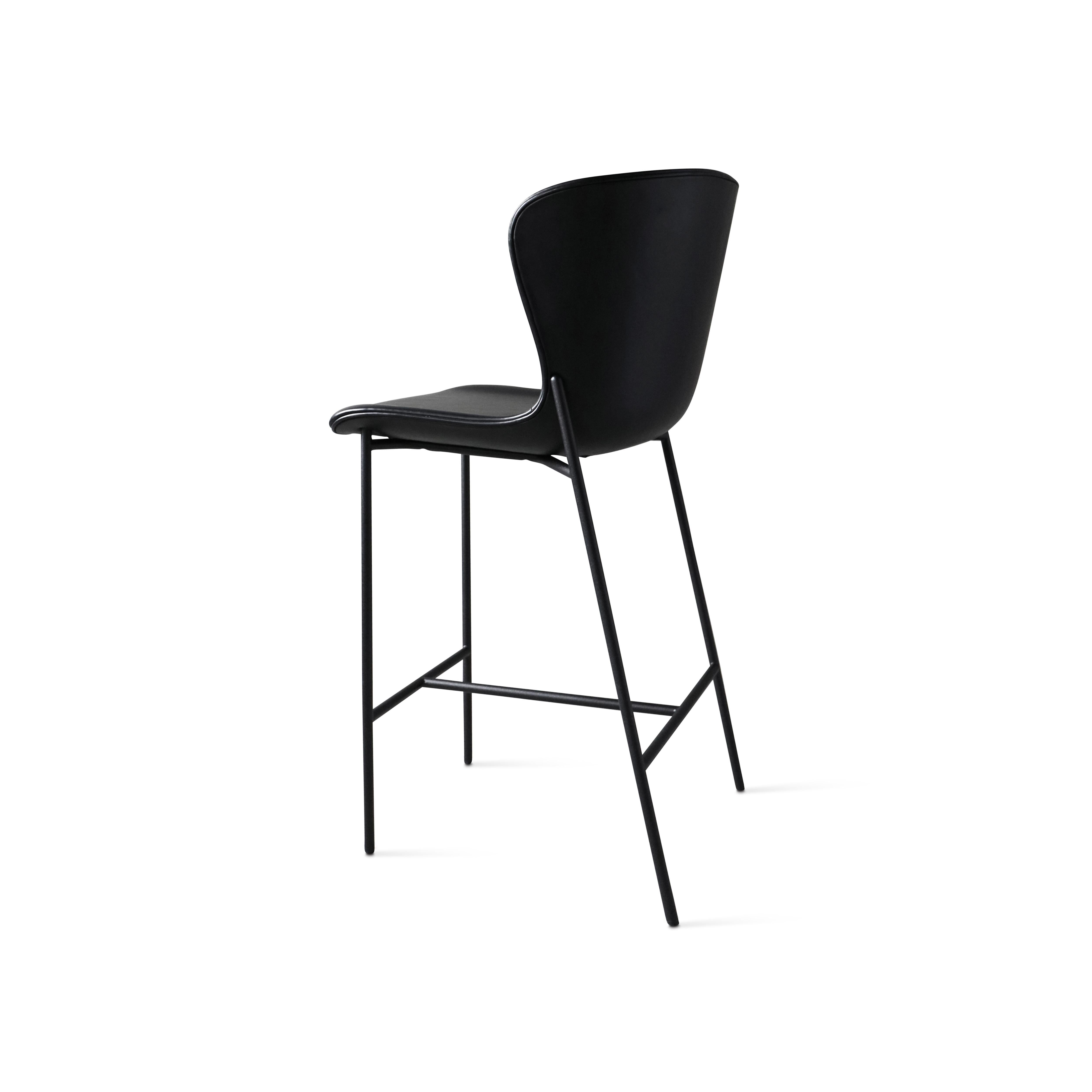 The 'Pipe' counter chair designed by Ida L. Hildebrand for Friends & Founders

Model shown in main picture: 
Fabric: Dakar Nevotex - Black Leather 0842 - Black Frame
Legs: Black steel

Dimensions 
H. 100 / W. 59 / D. 55 cm / Seat Height 65