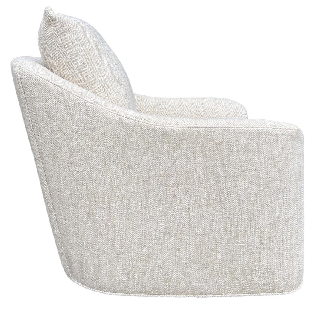 Custom made CR Laine Barrie Swivel Chair (1 available). This chair is showroom new and has never been used.

Barrie’s sloping arms and plush back pillow surround you in comfort, while the swivel base makes this an ideal lounge chair. All that’s