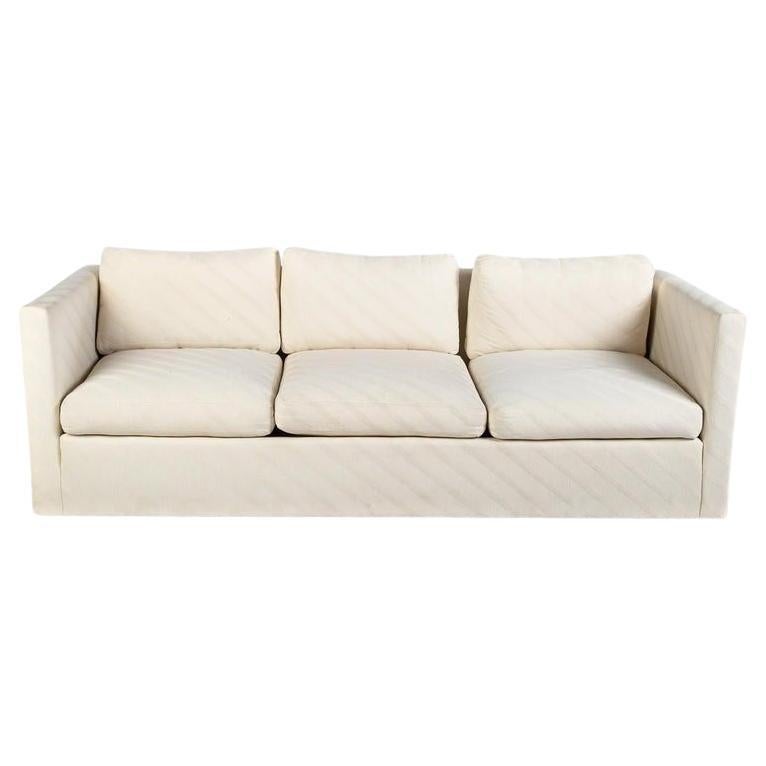 Divano contemporaneo a righe sbieche color crema