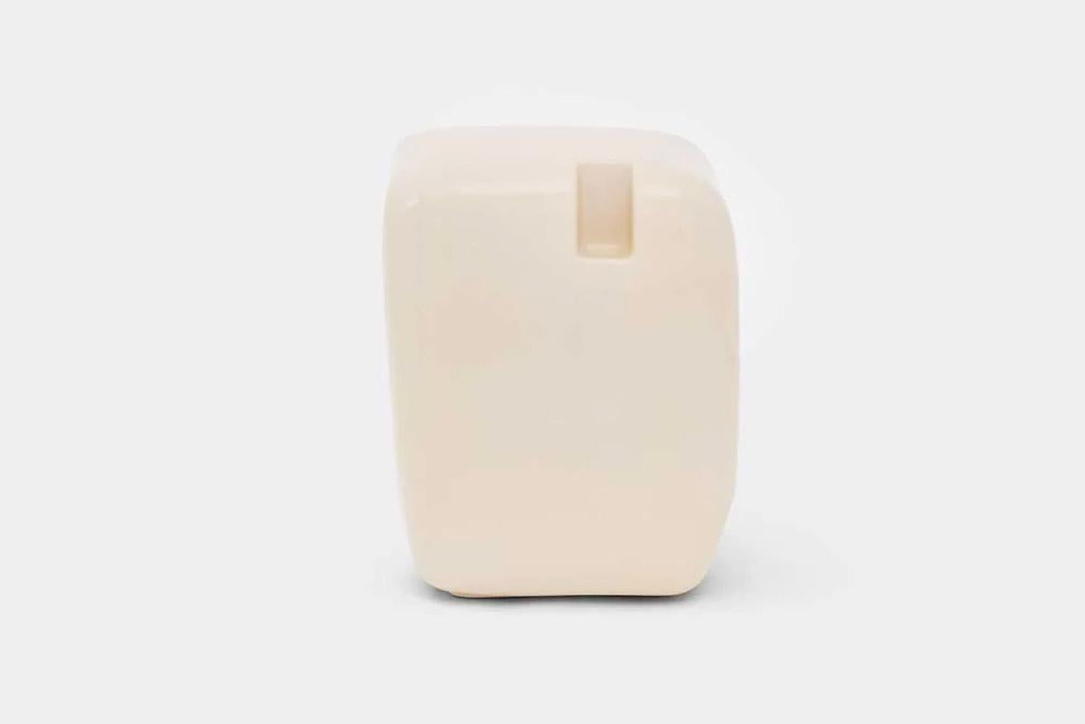 Contemporary cream ceramic tall side table / stool, Cobble Tall by Faye Toogood

Durable and smoothly rounded ceramic furniture with gentle asymmetries cast in a specialised laboratory-grade high gloss glaze suitable for interior and exterior