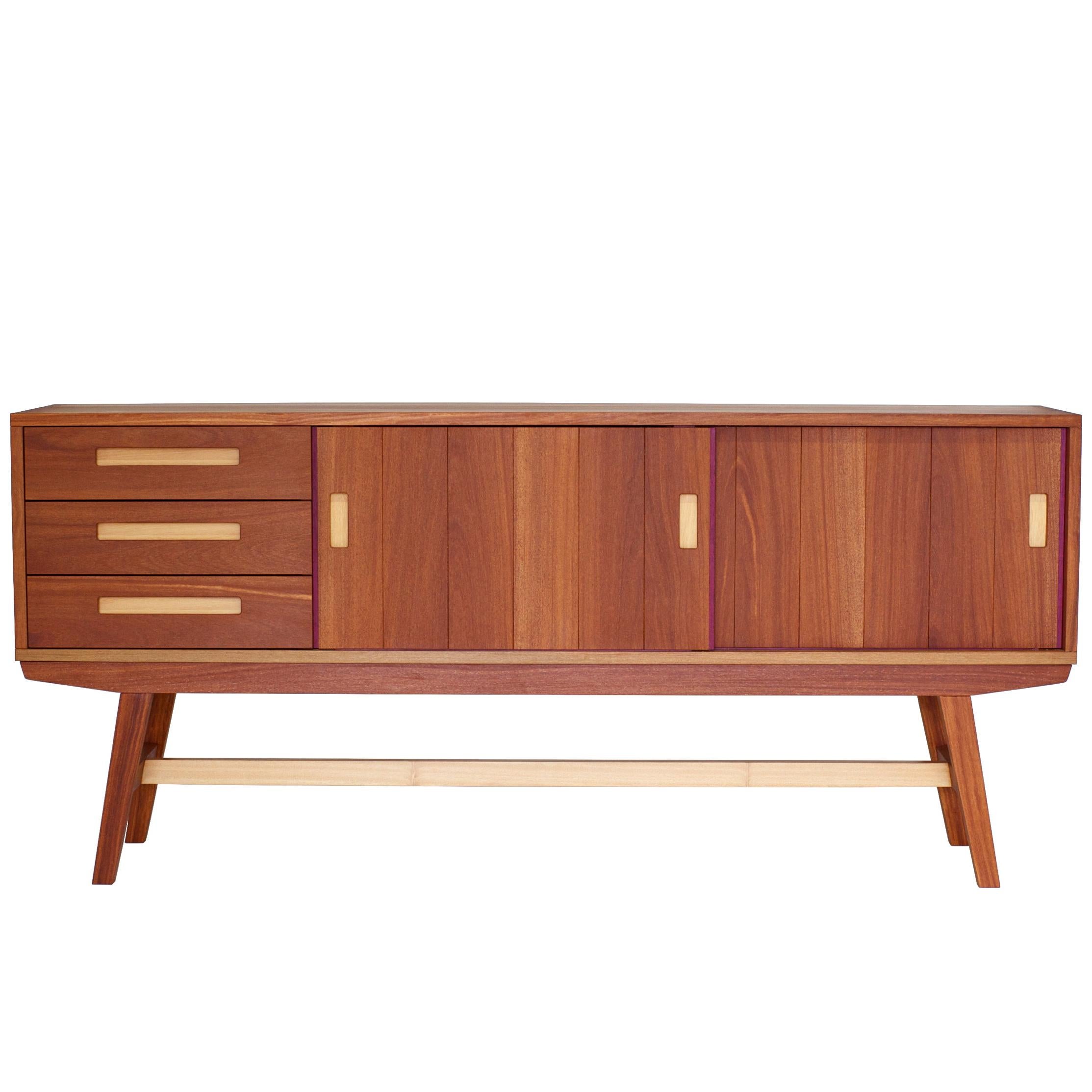 This contemporary credenza, buffet or low cabinet is a piece of furniture handcrafted in our own workshop. The credenza is carefully built with hardwood and traditional joints, such as dovetails, mortaises and tenons.

Elegant and functional, the
