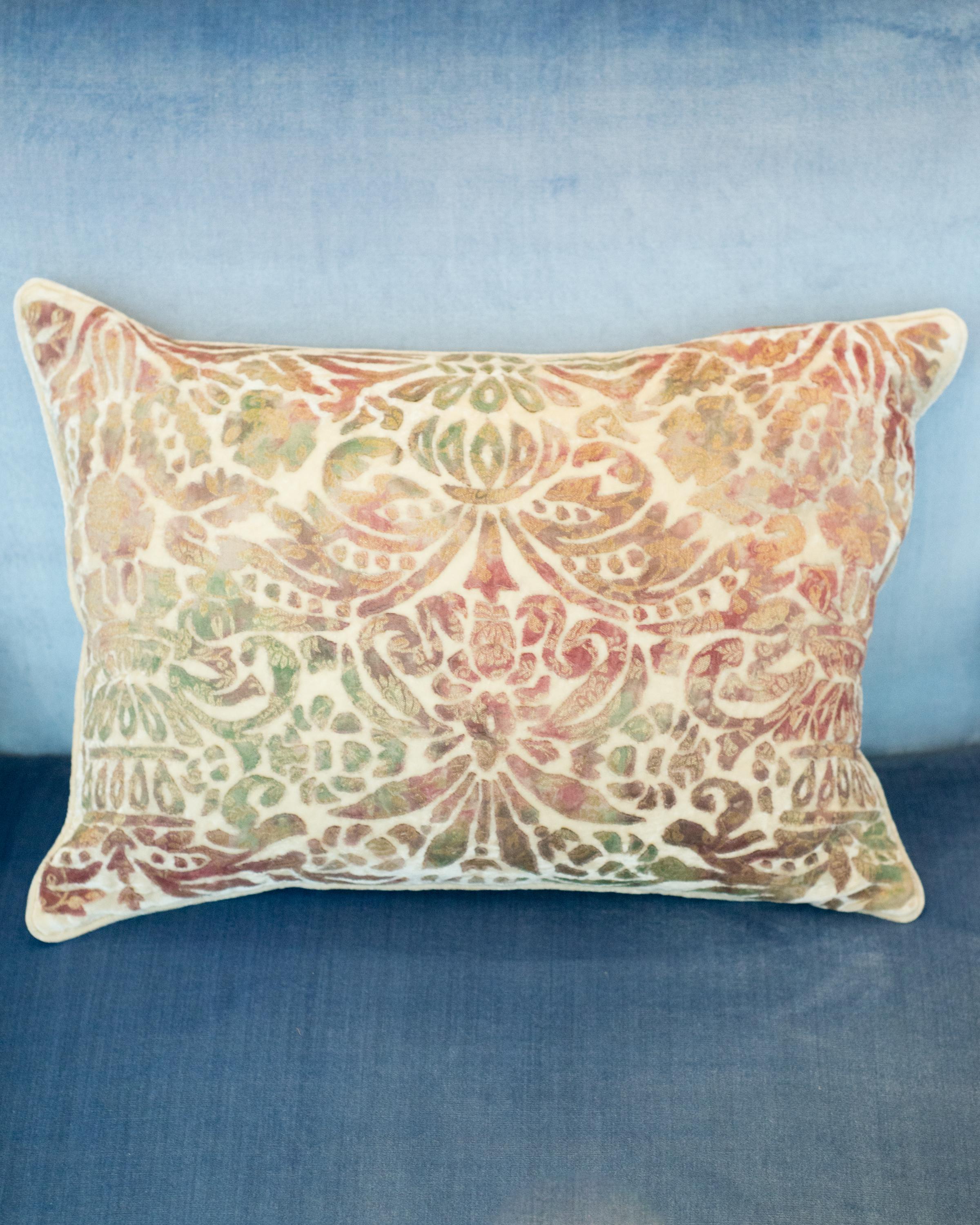 A creme silk velvet floral-embroidered cushion from Anke Dreschel featuring devoré details in multicolour, rectangle shape, and concealed rear zip fastening. Filled with 100% Canadian feather and down.