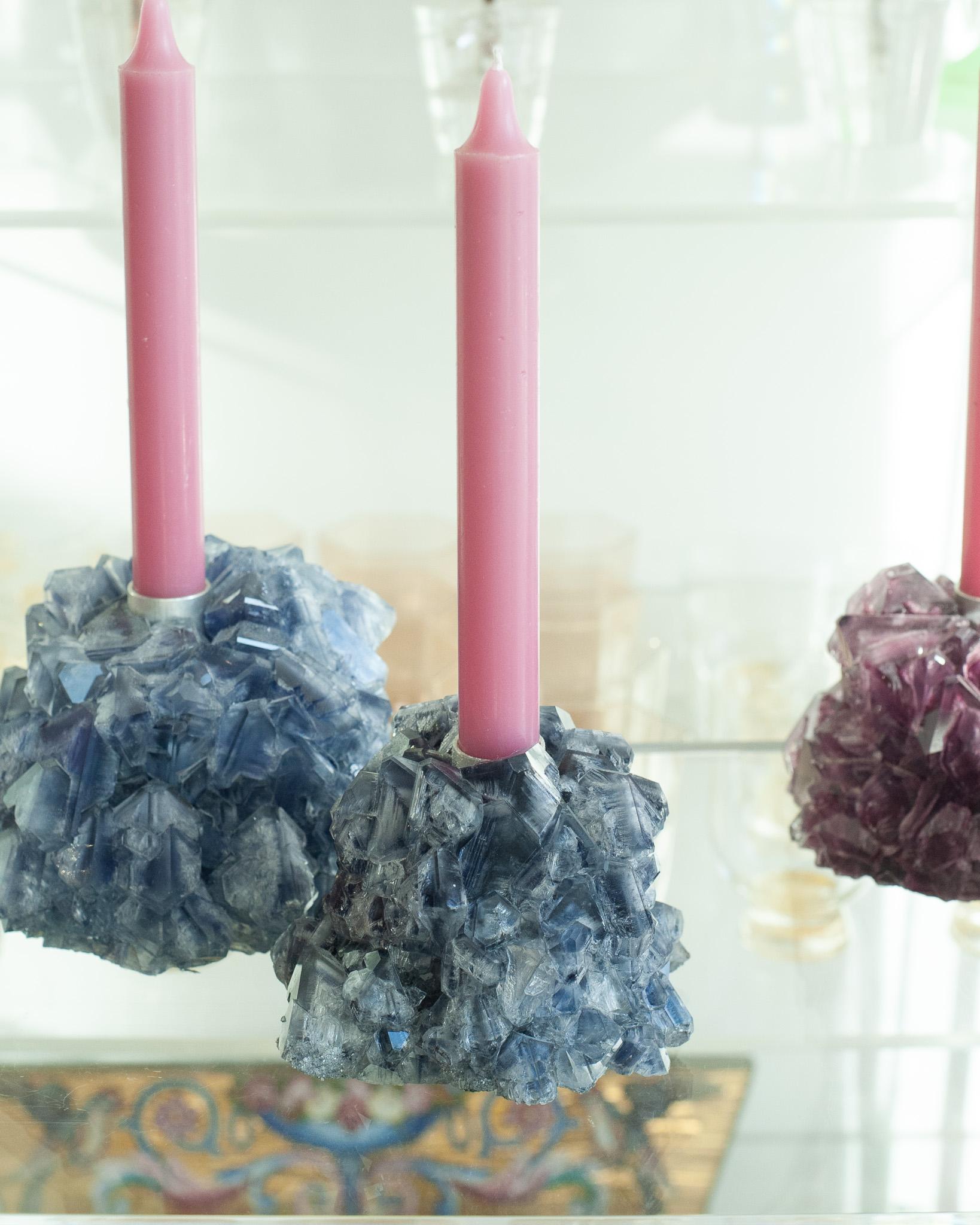 A stunning crystallized candleholder in blue, by artist Isaac Monté. This original work of art is produced through fascinating process, combining science and art. By dissolving minerals and oxides in hot water, the artist forms a solution that