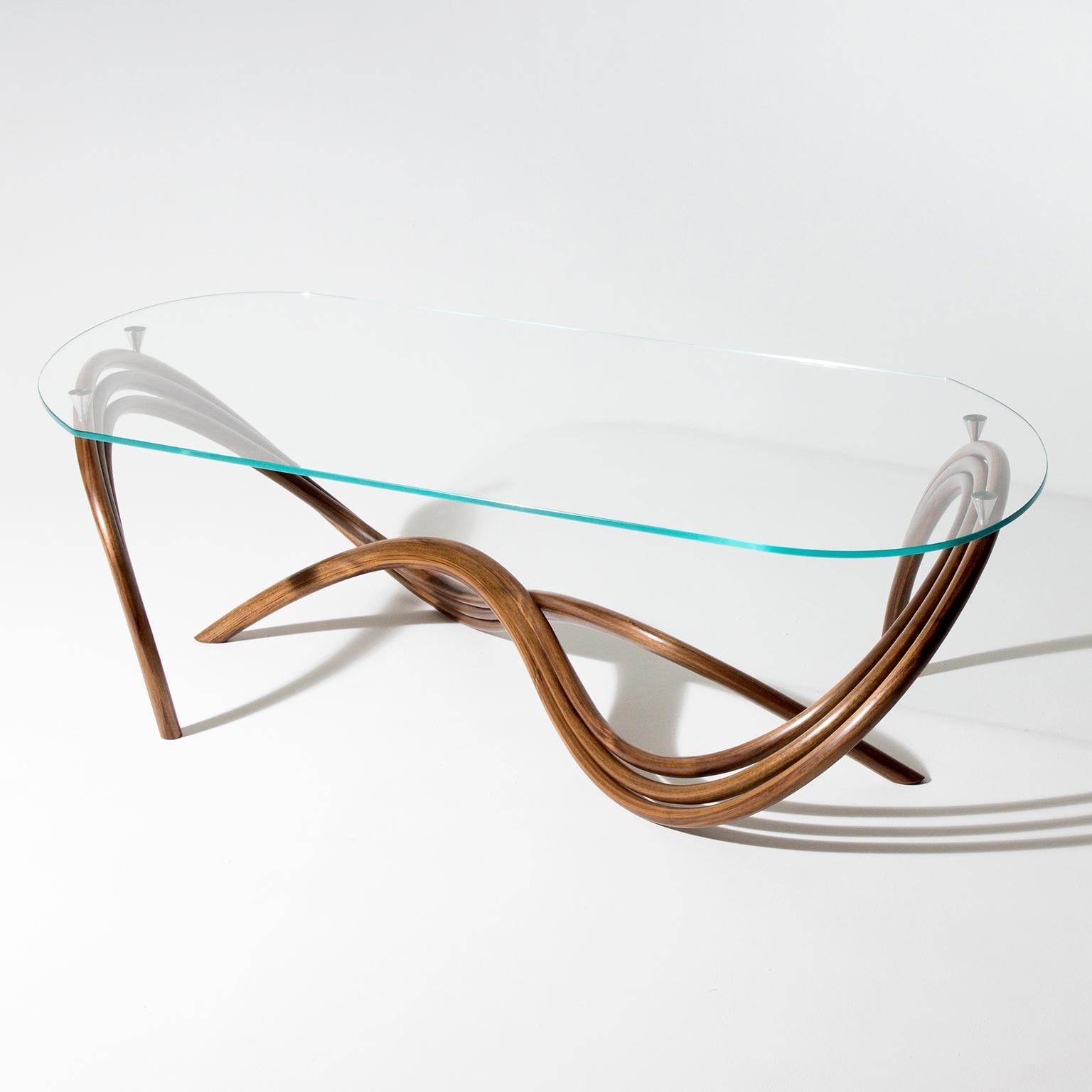 Oiled Contemporary Curved and Sculptural Coffee Table in Walnut and glass For Sale