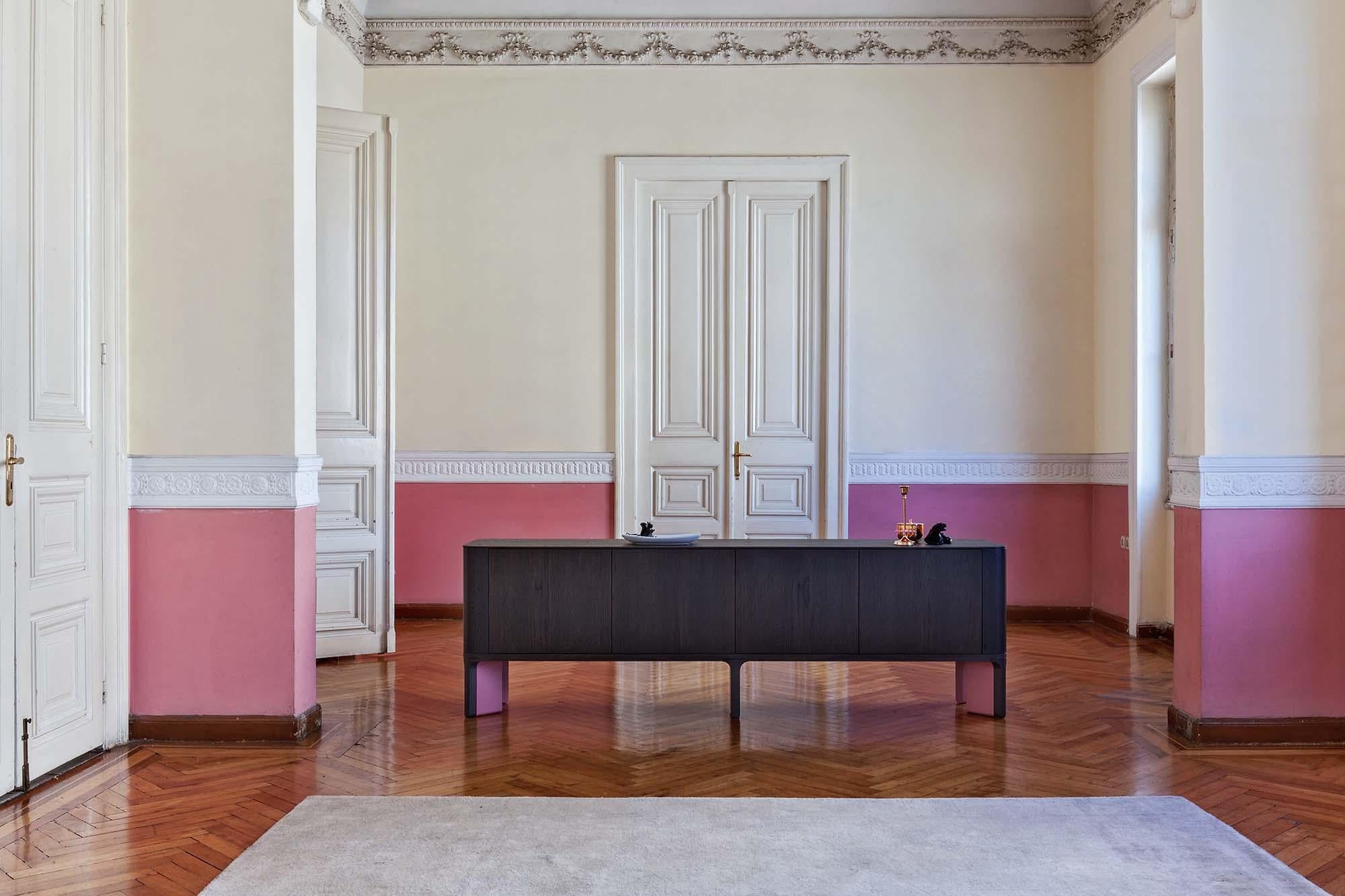 Handcrafted sideboard with round corners. Four push-pull doors and inside shelf, base in two sections in darkened oak veneer and coral lacquer. Internal cabinet always lacquered as base.
Please contact us if you have any questions about