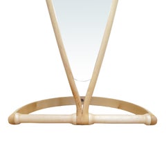 Contemporary curved teardrop shape full-length mirror made in Sycamore wood