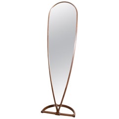 Contemporary curved teardrop shape full-length mirror made in walnut wood