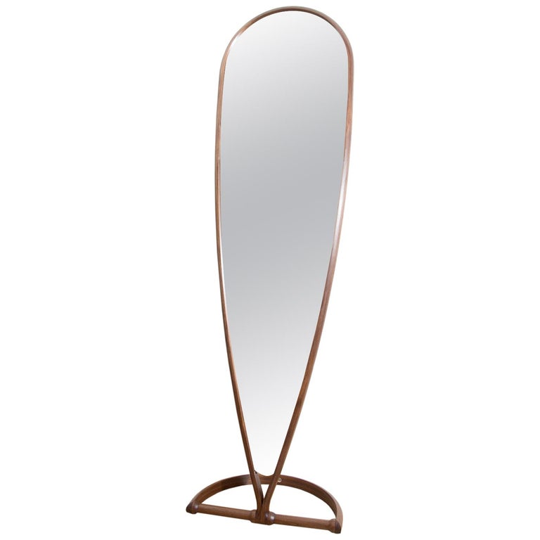 Contemporary curved teardrop shape fulllength mirror made in walnut