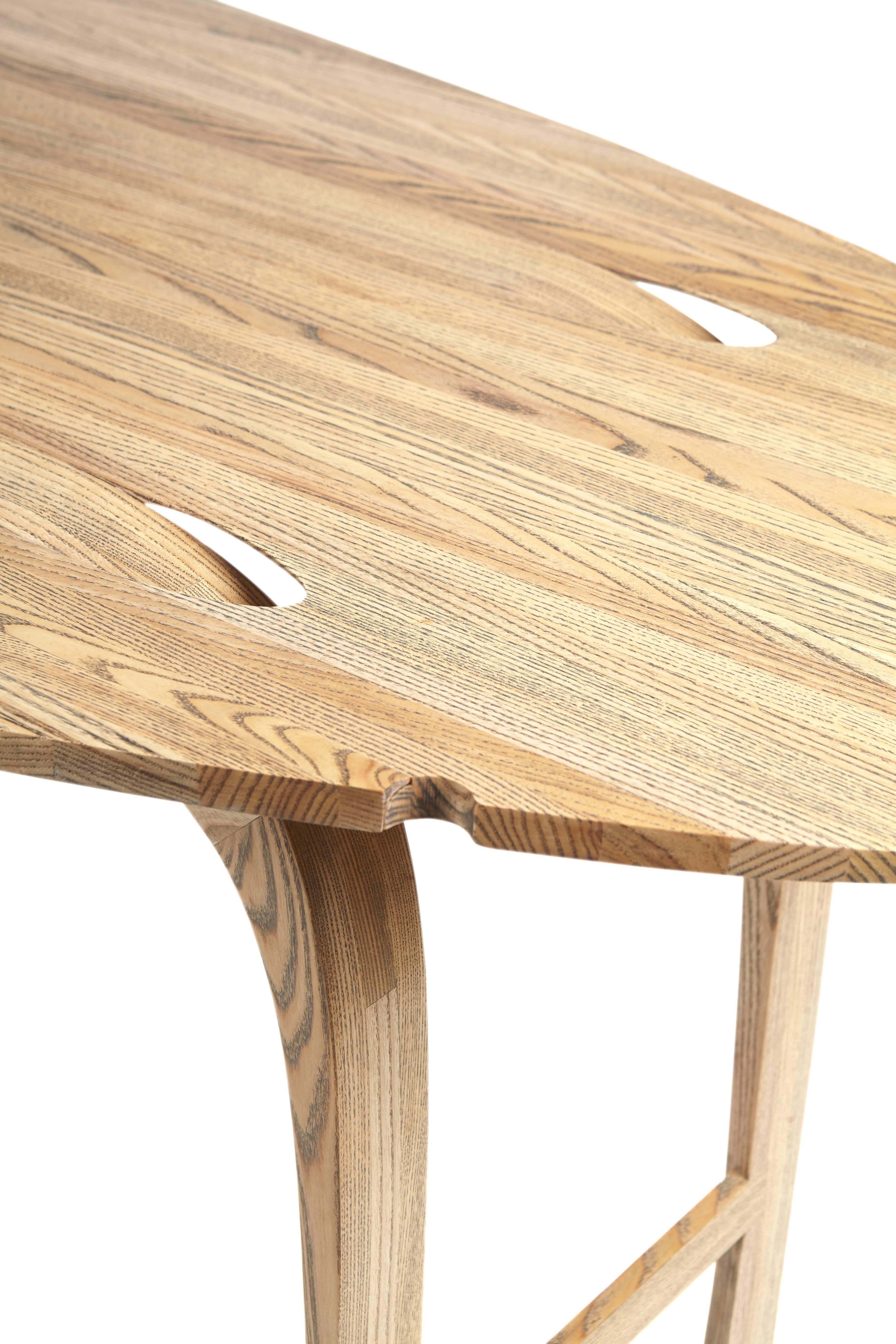 Modern Oval Drop-Leaf Table in solid ebony grain and white oil ash by Jonathan Field
