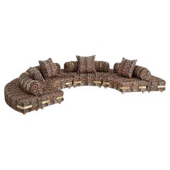 Contemporary Curved Sectional Sofa Upholstered in Leopard-Pattern Leather