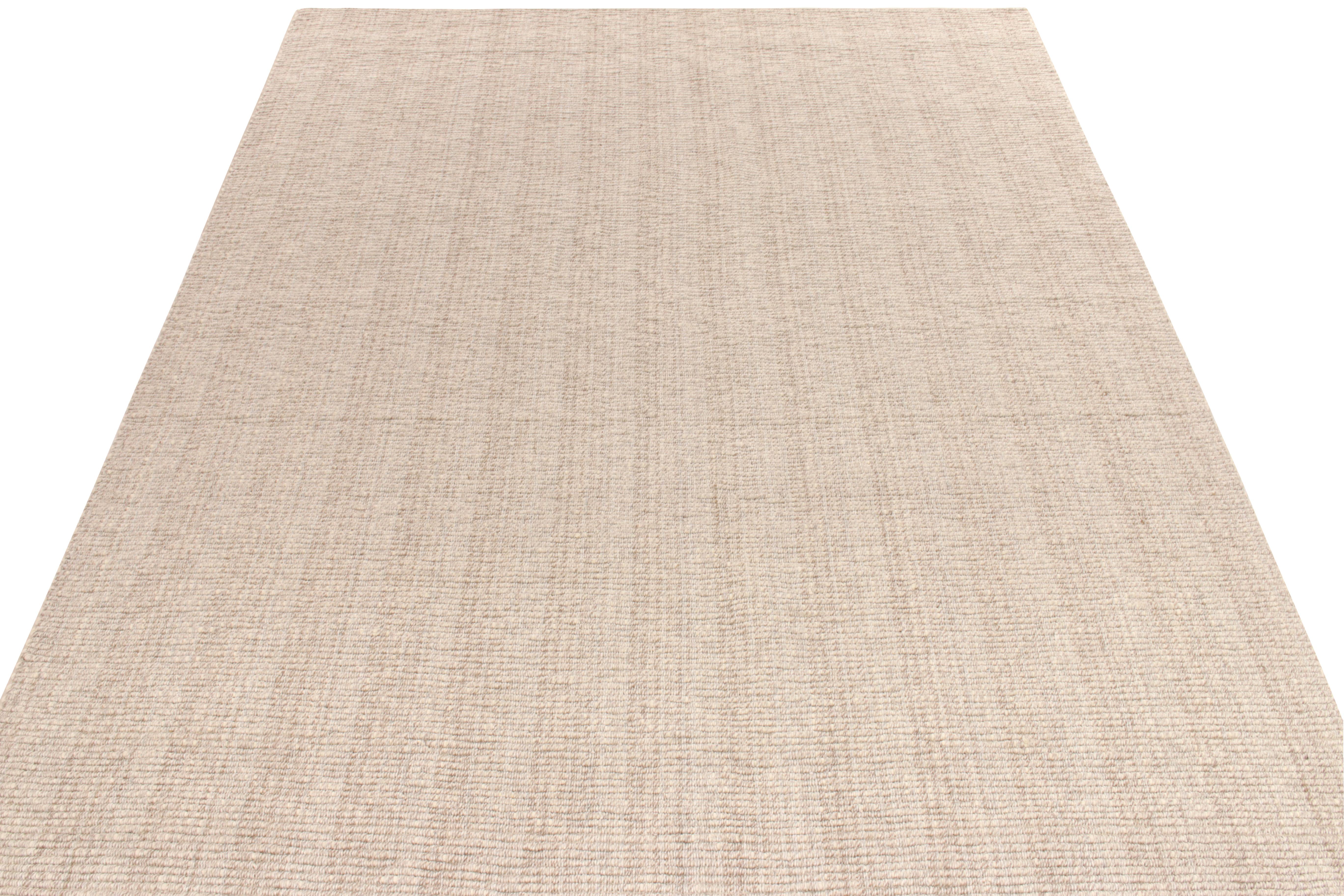 Handwoven in wool, a custom flatweave rug design available from our Kilim & Flatweave collection enjoying striations in beige & brown for a distinctive take in contemporary style. Exemplified in this 9x12 carrying structural strength & signature