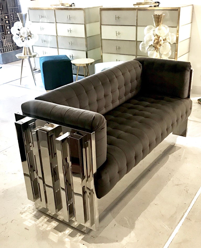 A custom handmade stainless steel “Cityscape” style sculptural sofa with grey Italian Velvet tufted upholstery.