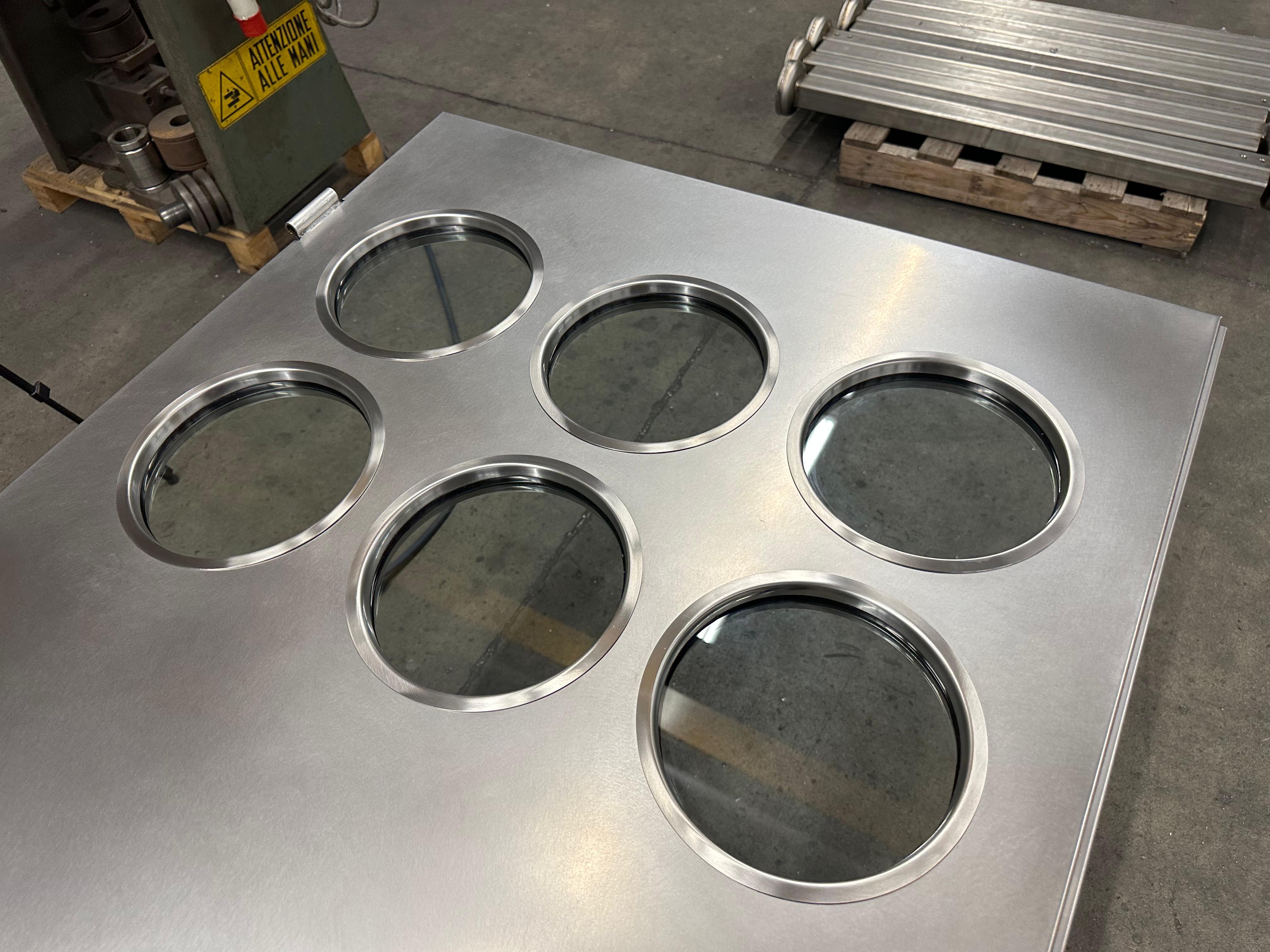 Contemporary custom made Spinzi stainless steel metal door with round portholes In New Condition For Sale In Milano, IT