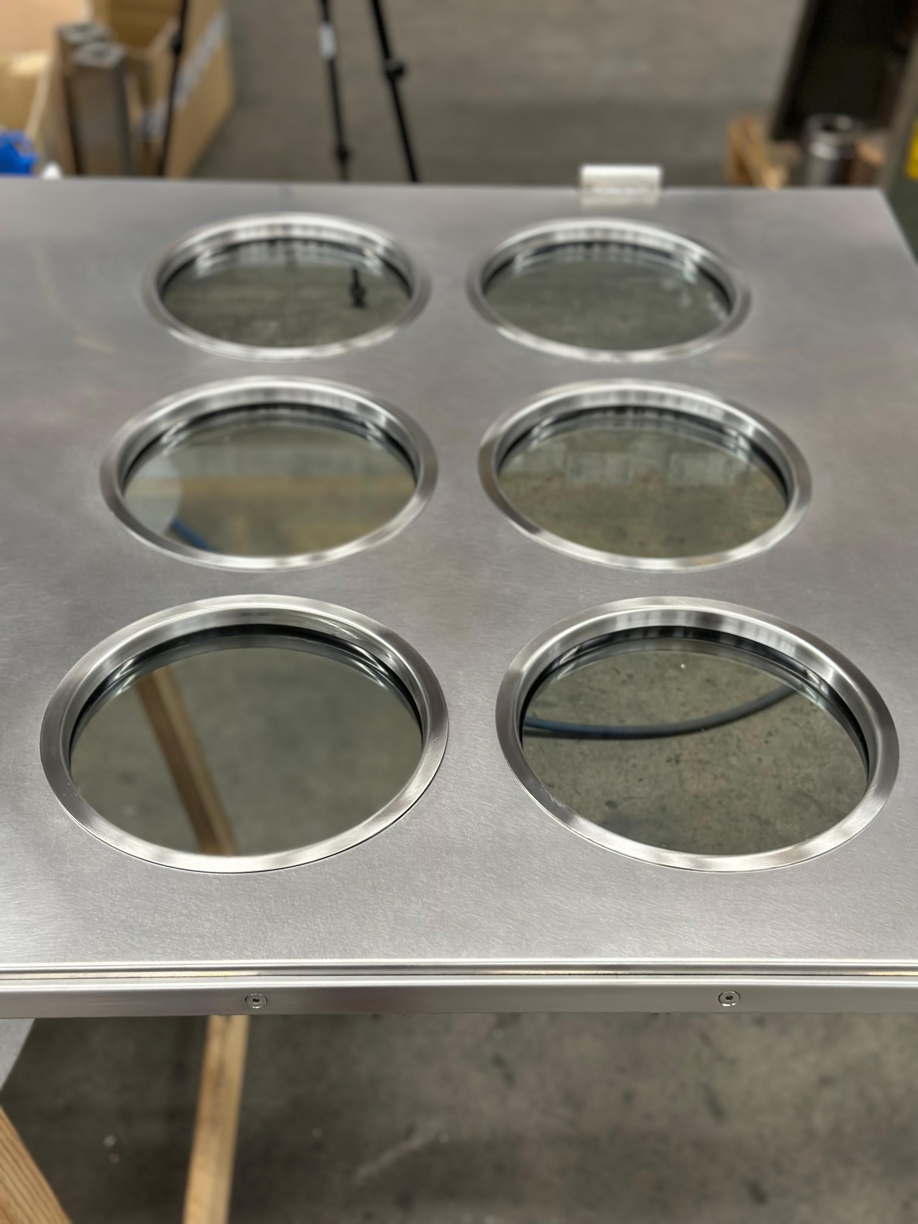 Stainless Steel Contemporary custom made Spinzi stainless steel metal door with round portholes For Sale