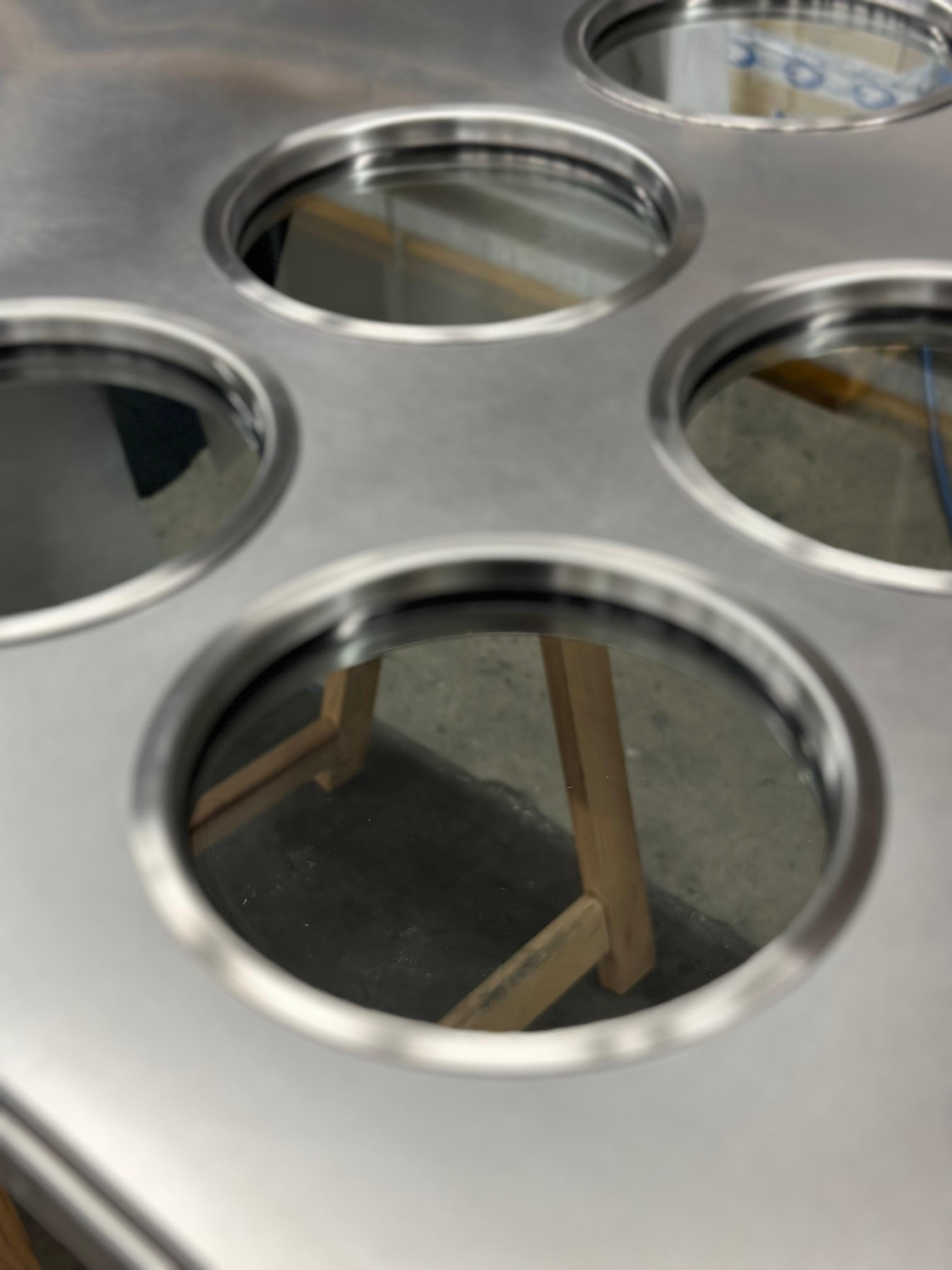 Contemporary custom made Spinzi stainless steel metal door with round portholes For Sale 3