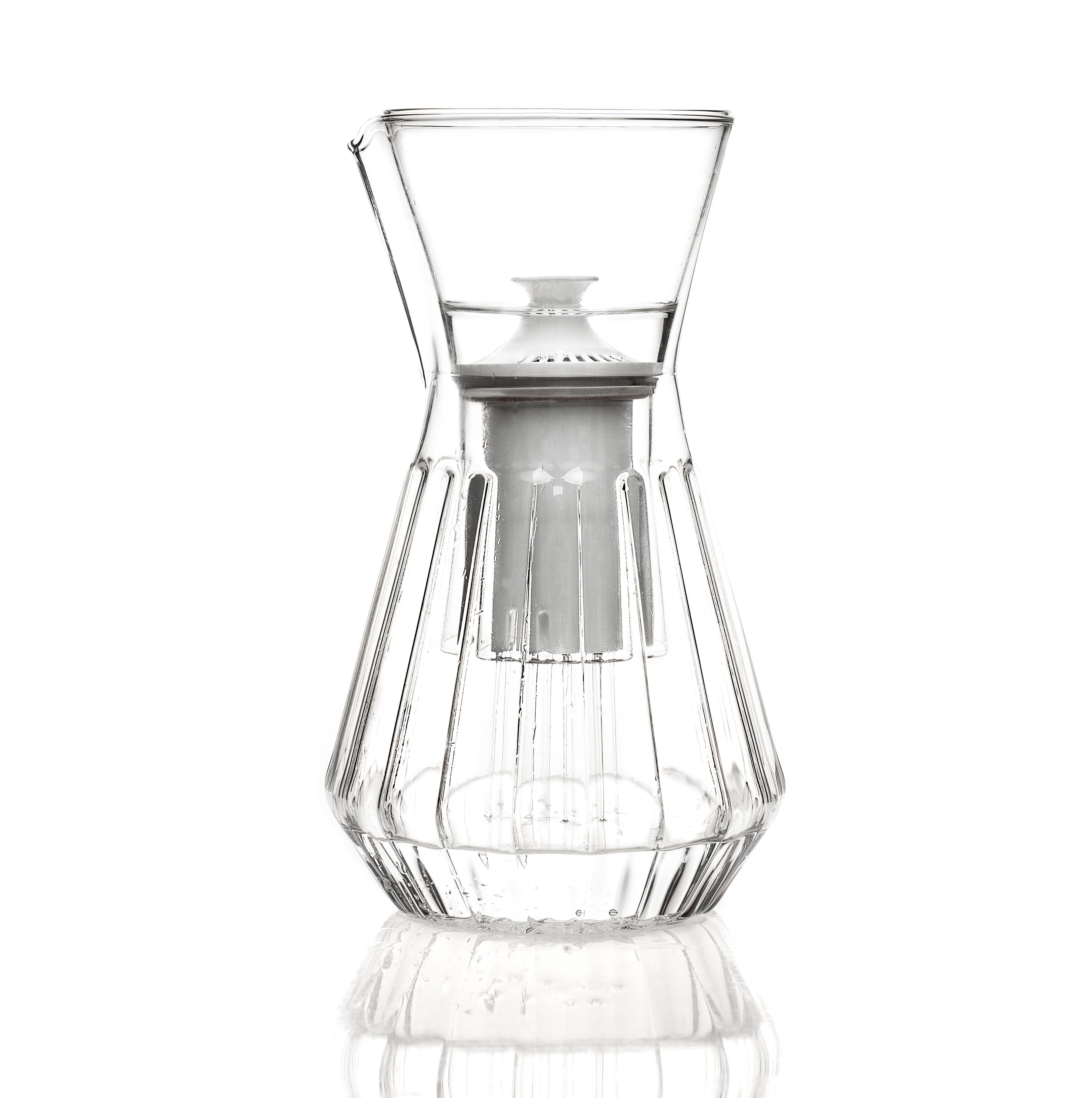 Finding the beauty in a simple, everyday object is one of the joys of life. Be it left out on your counter or table the contemporary clear glass fluted talise water carafe pitcher is minimal and can fit with any home. For use with the glass funnel