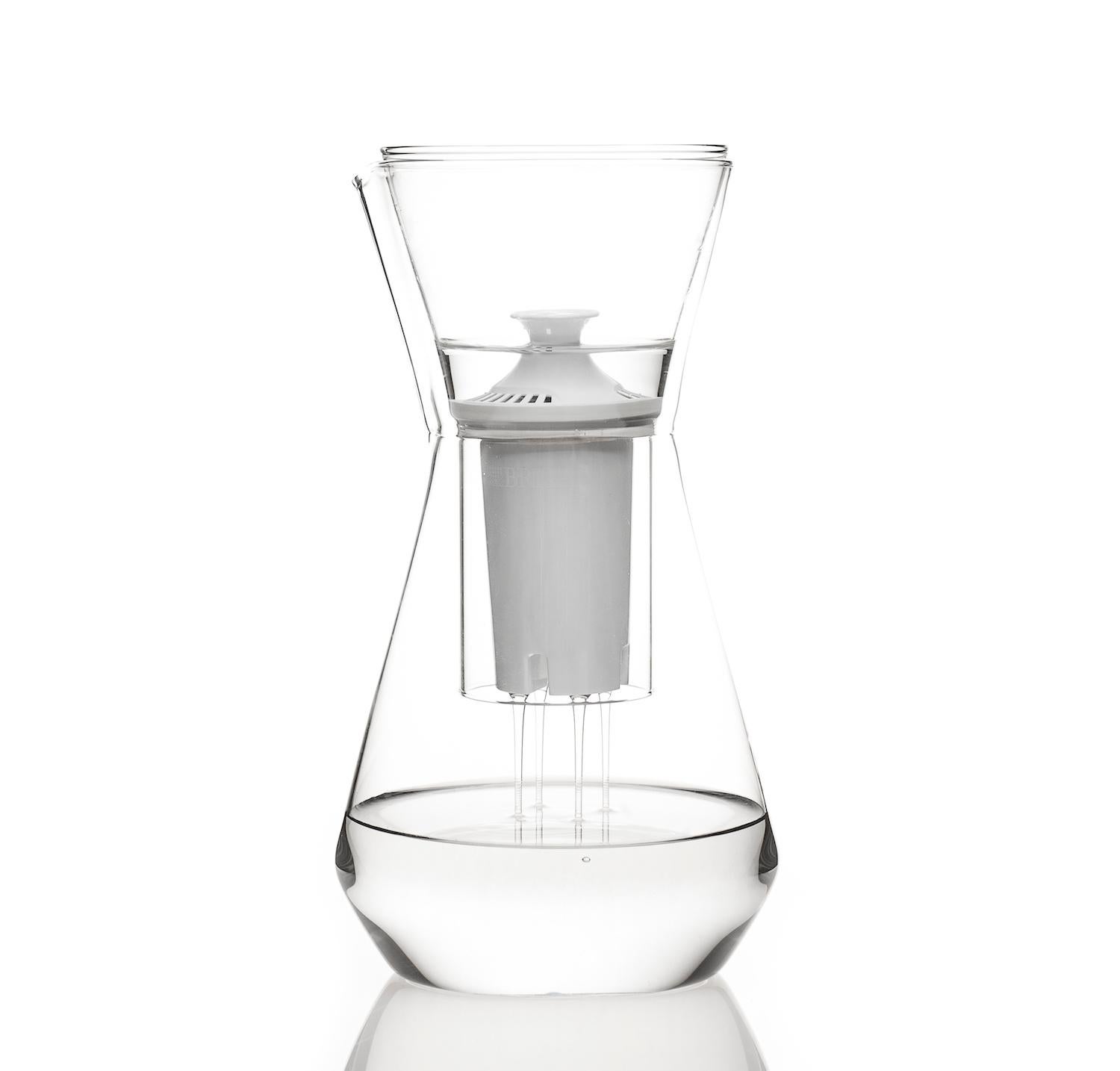 Finding the beauty in a simple, everyday object is one of the joys of life. Be it left out on your counter or table the contemporary clear glass Talise water carafe pitcher is minimal and can fit with any home. For use with the glass funnel for