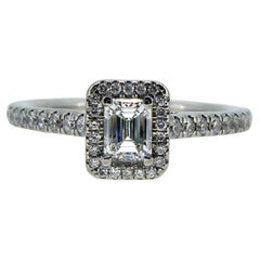 Contemporary D Colour, Emerald Cut Diamond Ring with Diamond Set Halo and Band