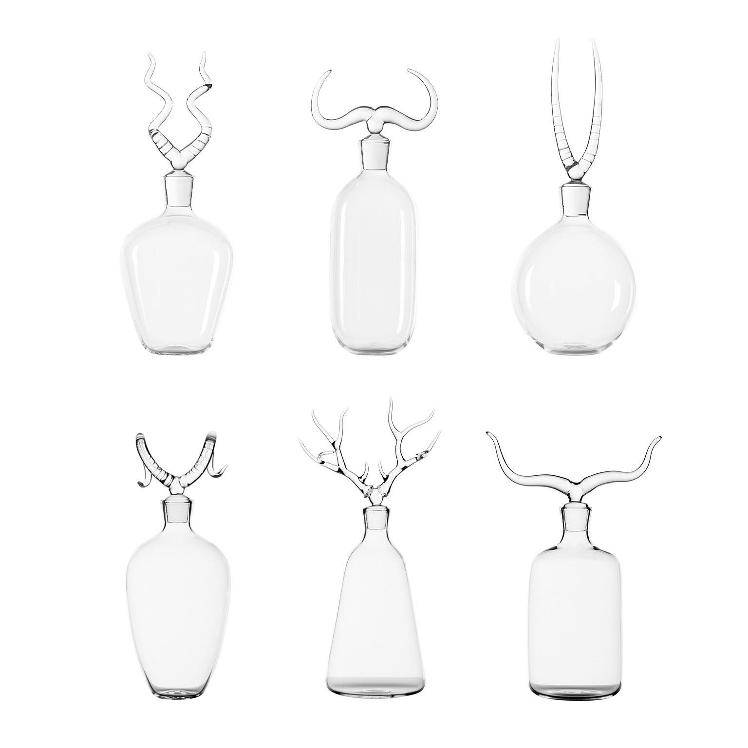 green alcohol bottle with deer