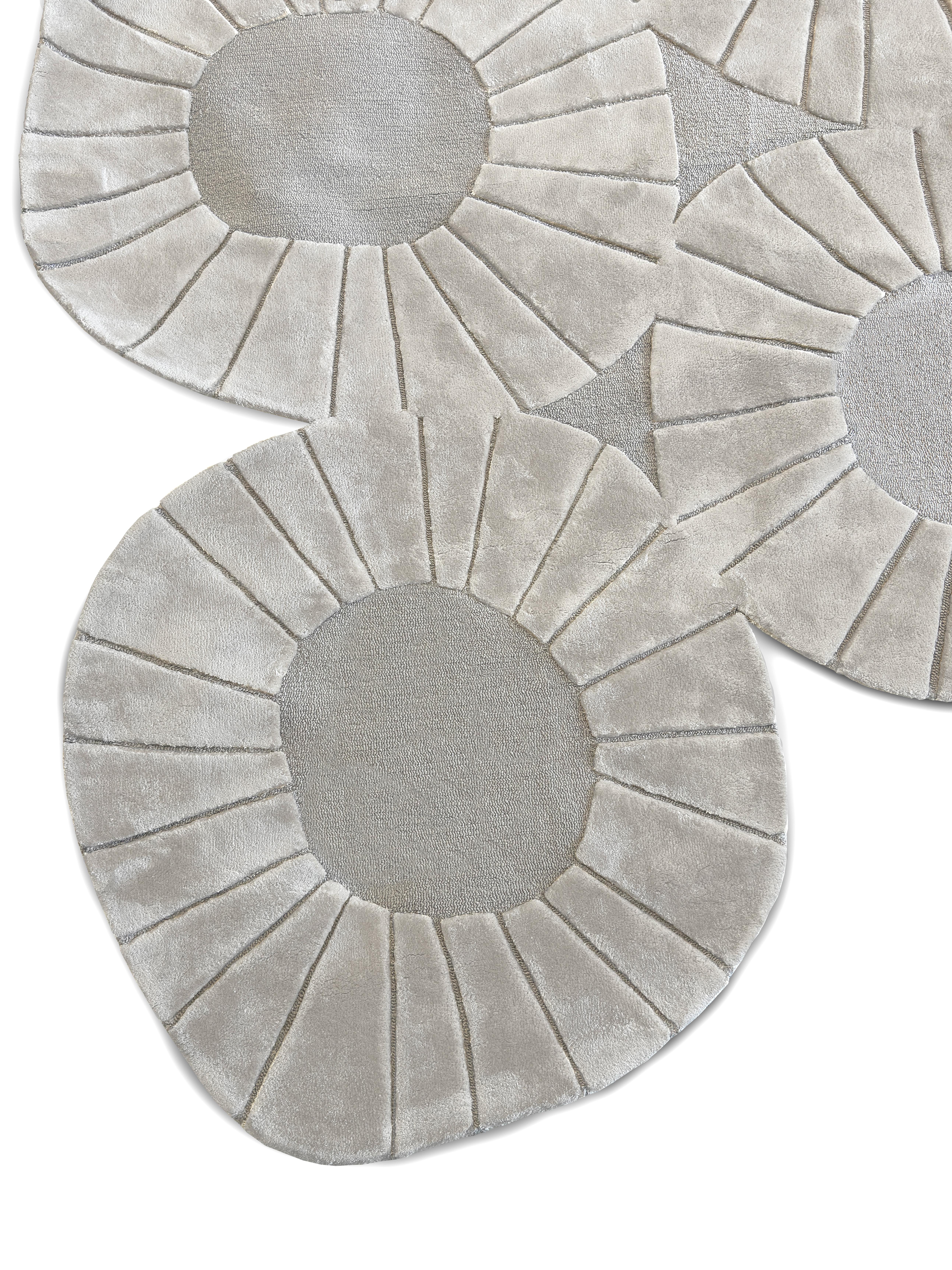 Tapis Pastel #16 is a pastel rug that mixes mid-century modern vibes with Memphis Design style.
This pastel area rug has an irregular shape with round edges that makes it perfect for a modern or contemporary interior design project. 
Made of wool, a