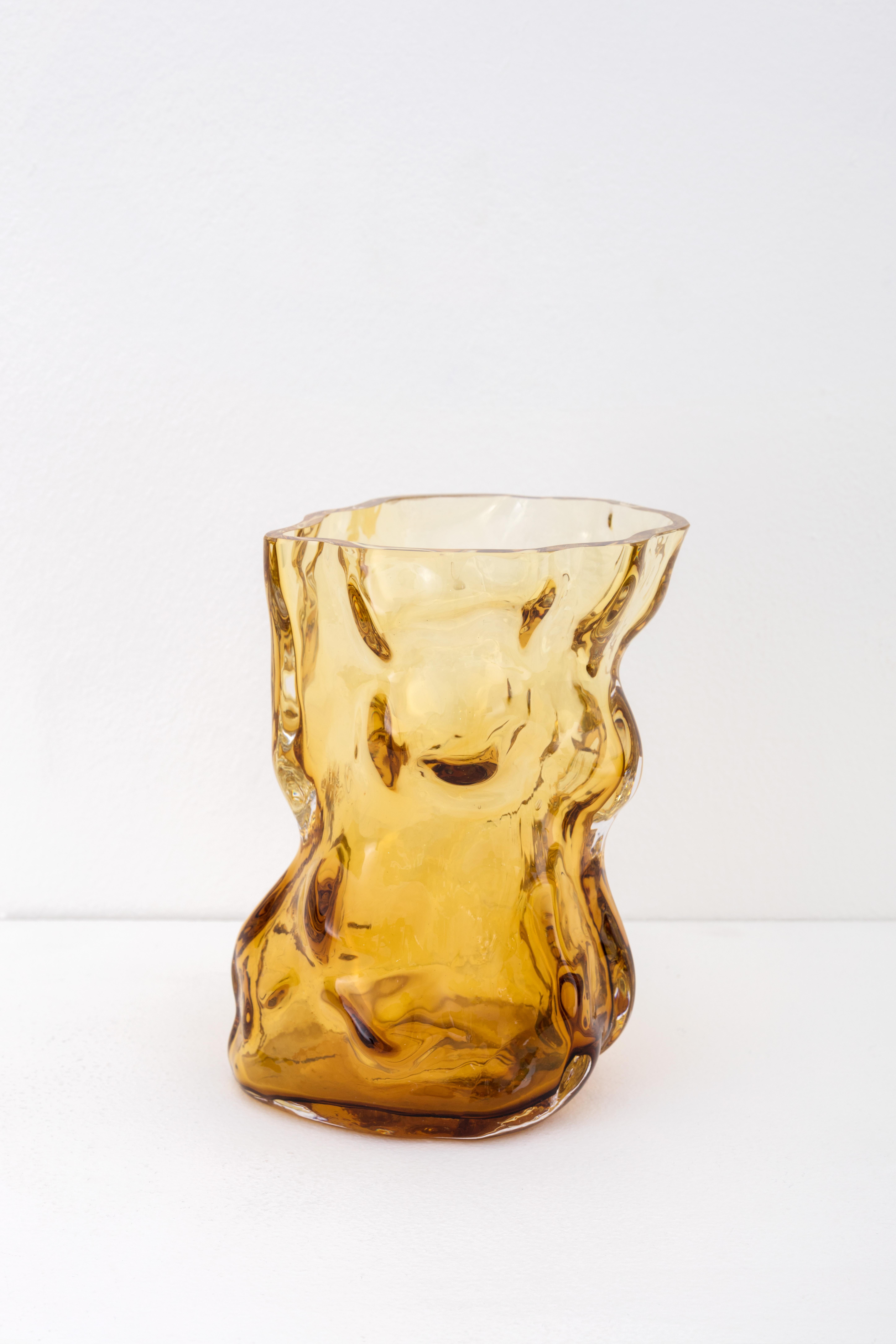 Moulded and then mouth blown glass

One of a kind

The Mountain vases by FOS embody the surface of the mountain, calibrated to the size of human interiors. FOS explains, “It’s limited what references an object into a vase, other than a flower: A