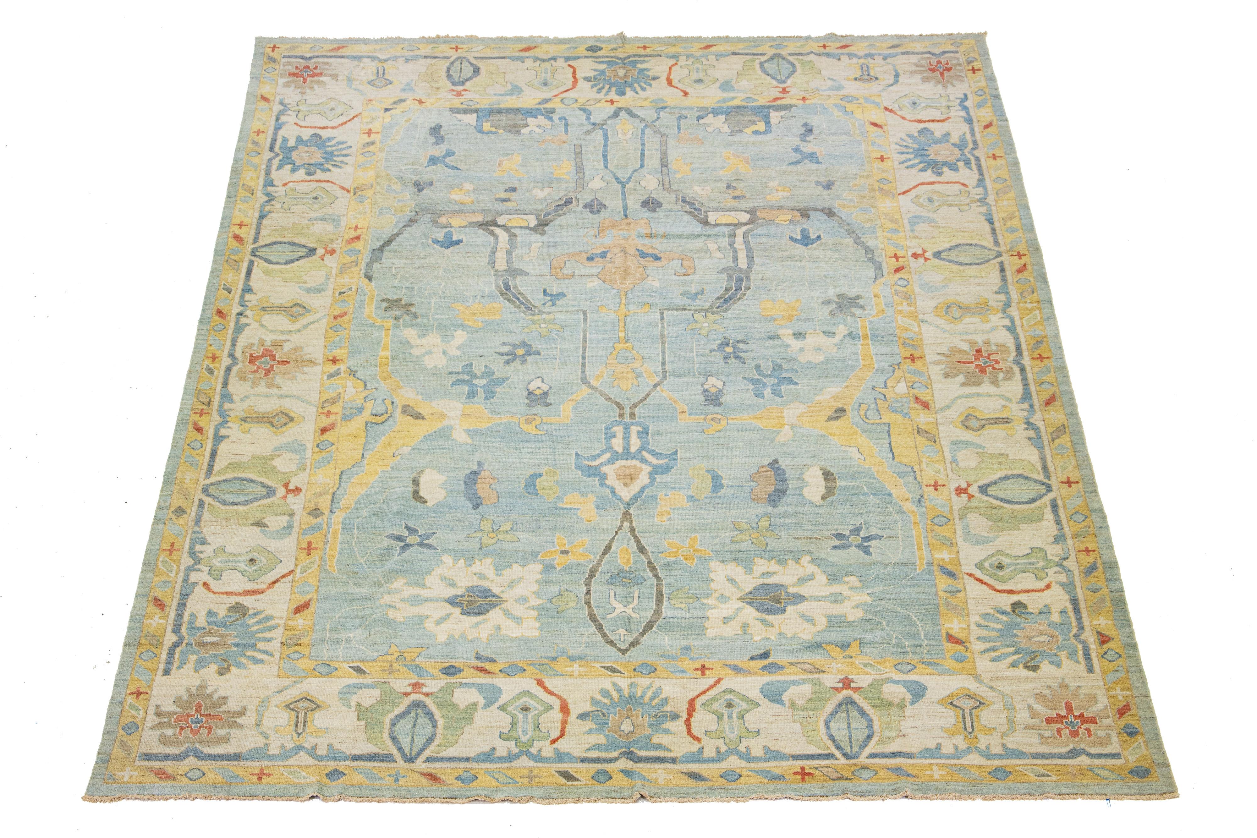 Beautiful modern Sultanabad hand-knotted wool rug with a light blue field. This Sultanabad rug has multicolor accents in a gorgeous all-over classic floral pattern design.

This rug measures 12' x 15'2