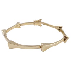 Contemporary Designer Gold Bangle Style Bracelet